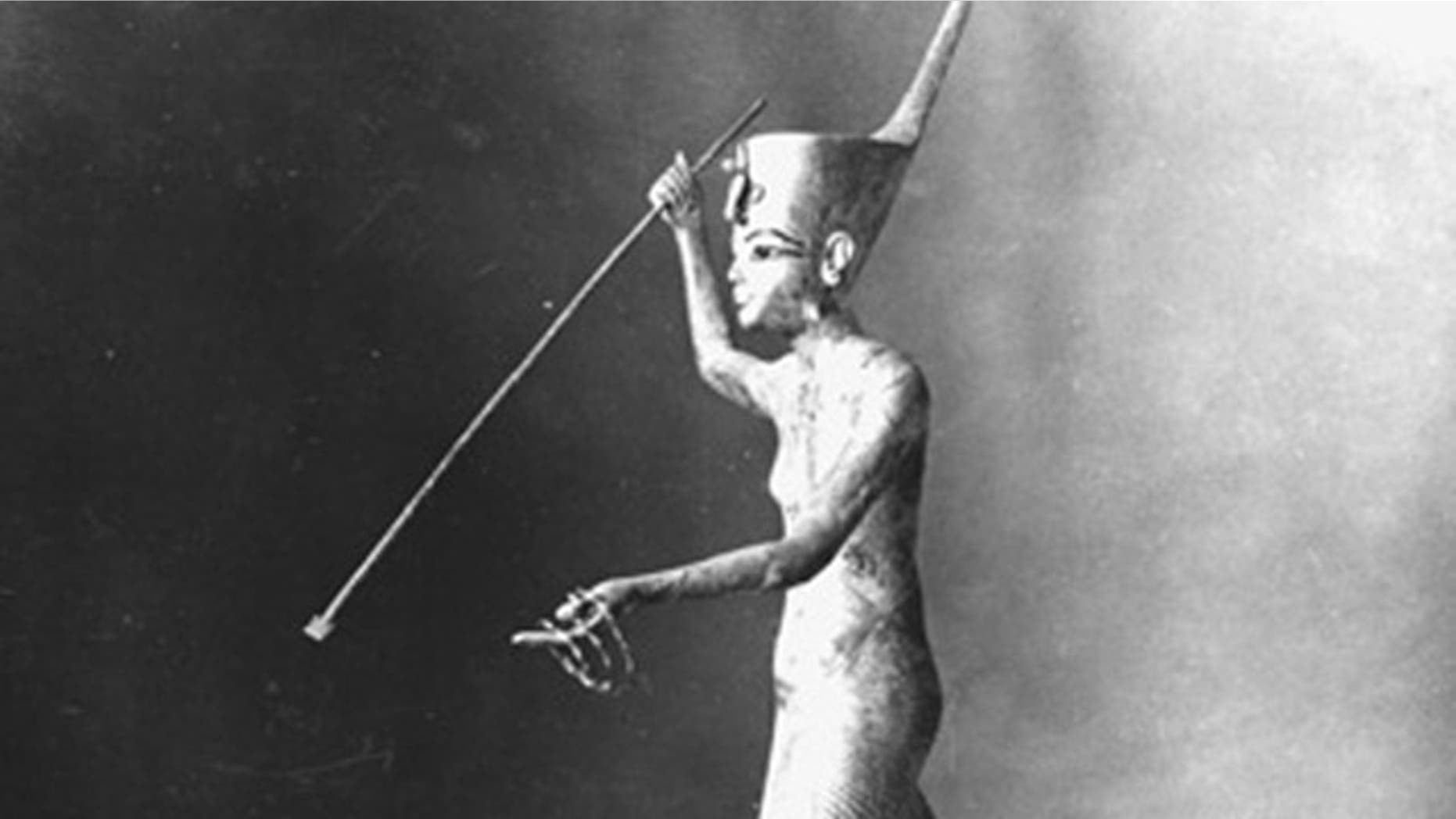 This undated photo released by the Egyptian Ministry of Antiquities shows a gilded wooden statue of King Tutankhamun harpooning. According to the Ministry of Antiquities, a full inventory of the Egyptian Museum has found that looters escaped with 18 items, including this one, during the anti-government unrest.