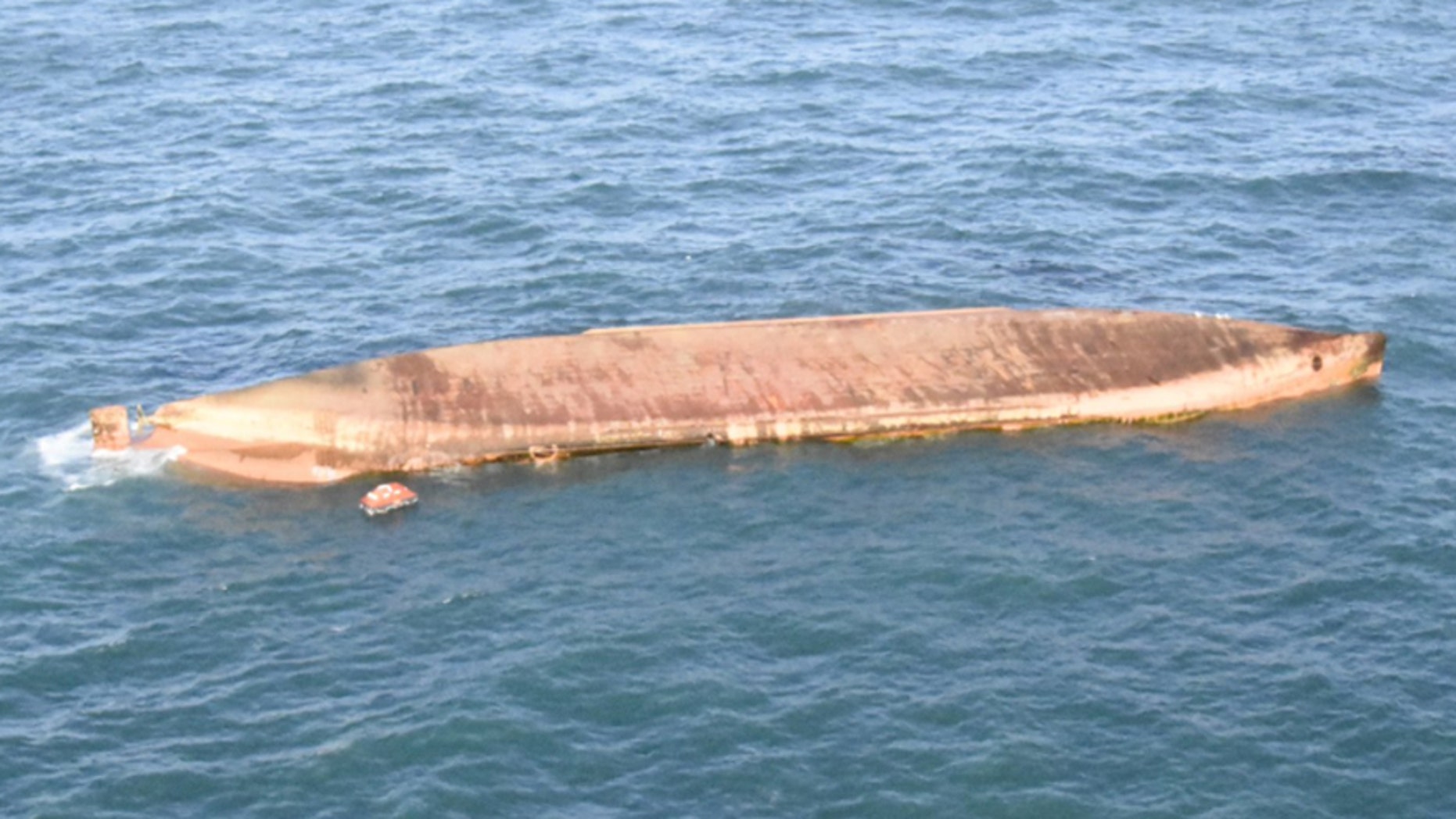 A cargo ship is floating upside down in the English Channel after colliding with a fishing vessel Tuesday.