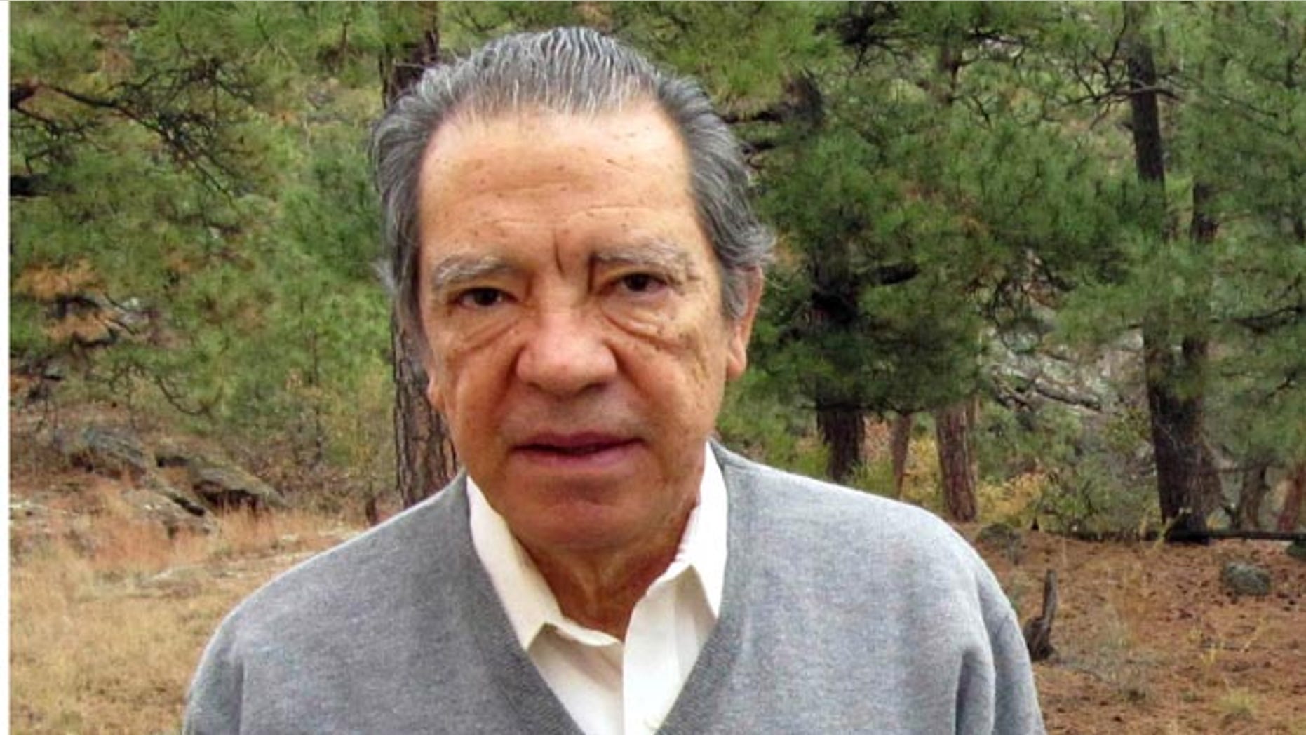 FILE - This Oct. 22, 2009, file photo shows former Los Alamos National Laboratory nuclear physicist Pedro Leonardo Mascheroni on his back deck in Los Alamos, N.M. Mascheroni pleaded guilty to trying to help Venezuela develop a nuclear weapon was sentenced Wednesday, Jan. 28, 2015, to five years in prison and three years of supervised release. Mascheroni and his wife, Marjorie Roxby Mascheroni, had pleaded guilty in 2013 to offering to help develop a nuclear weapon for Venezuela through dealings with an undercover FBI agent posing as a representative of the socialist South American country. (AP Photo/Heather Clark, File)
