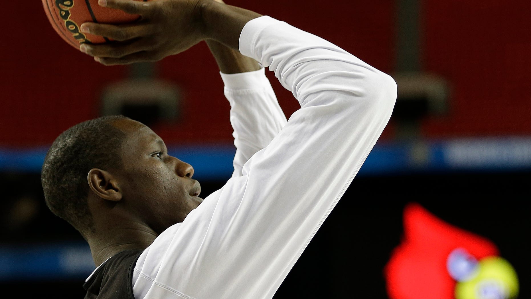 Louisville's Gorgui Dieng shoots during practice for their NCAA Final Four tournament college basketball semifinal game against Wichita State, Friday, April 5, 2013, in Atlanta. Louisville plays Wichita State in a semifinal game on Saturday. (AP Photo/David J. Phillip)