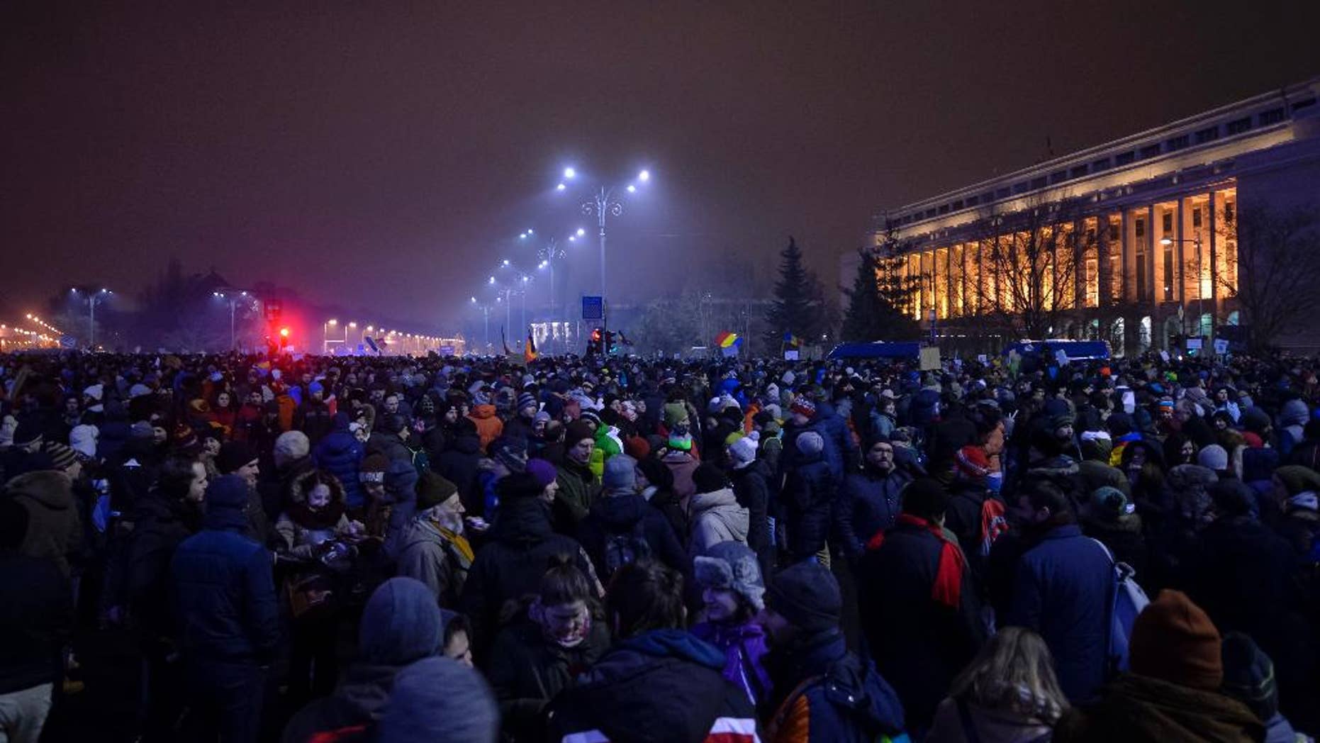 Some thousands march during a protest against the government's proposal to pardon thousands of prisoners, in Bucharest, Romania, Sunday, Jan. 22, 2017. Some thousands marched through the streets of the Romanian capital and other cities to protest against the pardon of prisoners which critics say could weaken the anti-corruption fight. (AP Photo/Andreea Alexandru)