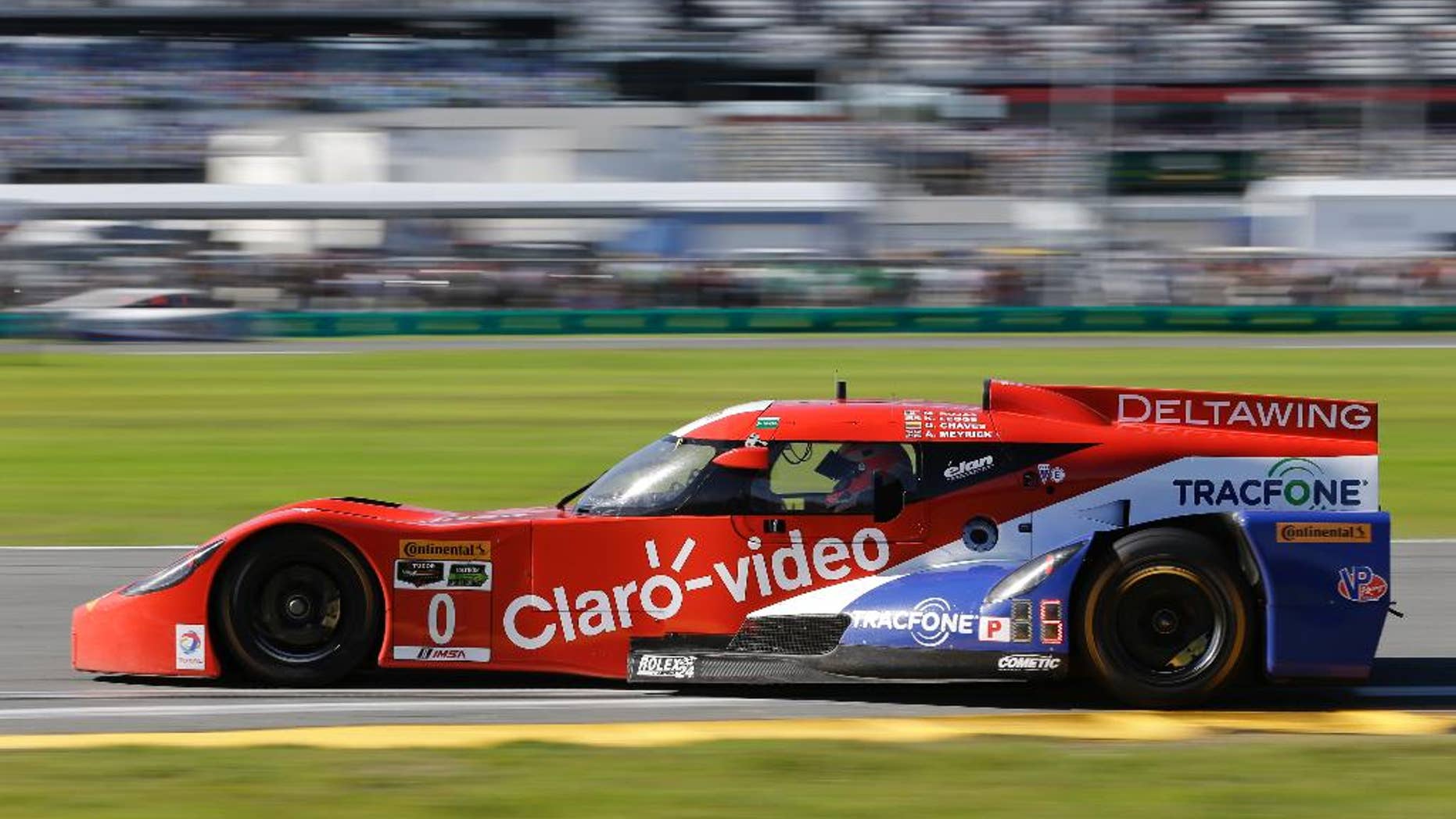 In this Saturday, Jan. 24, 2015 file photo, Andy Meyrick, of England, drives the DeltaWing DWC13 Elan out of turn during the IMSA 24 hour auto race at Daytona International Speedway in Daytona Beach, Fla. Among the story lines in IMSA this year is the strength of the odd-looking DeltaWing, which led laps in the season-opening Rolex 24 at Daytona. (AP Photo/John Raoux, File)