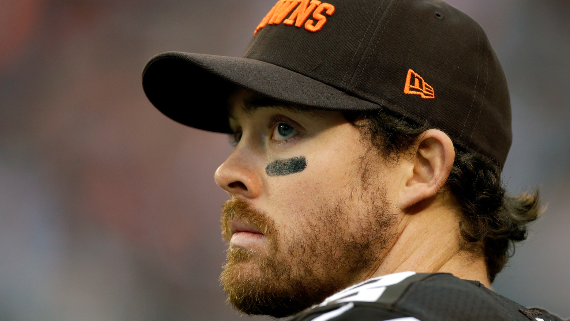 FILE- In this Dec. 16, 2012, file photo, Cleveland Browns quarterback Colt McCoy watches from the sidelines during an NFL football game in Cleveland. McCoy, who became expendable when Cleveland signed veteran free agent Jason Campbell last week, was traded Monday, April 1, 2013 to the San Francisco 49ers, a person familiar with the deal told The Associated Press. (AP Photo/Mark Duncan, File)