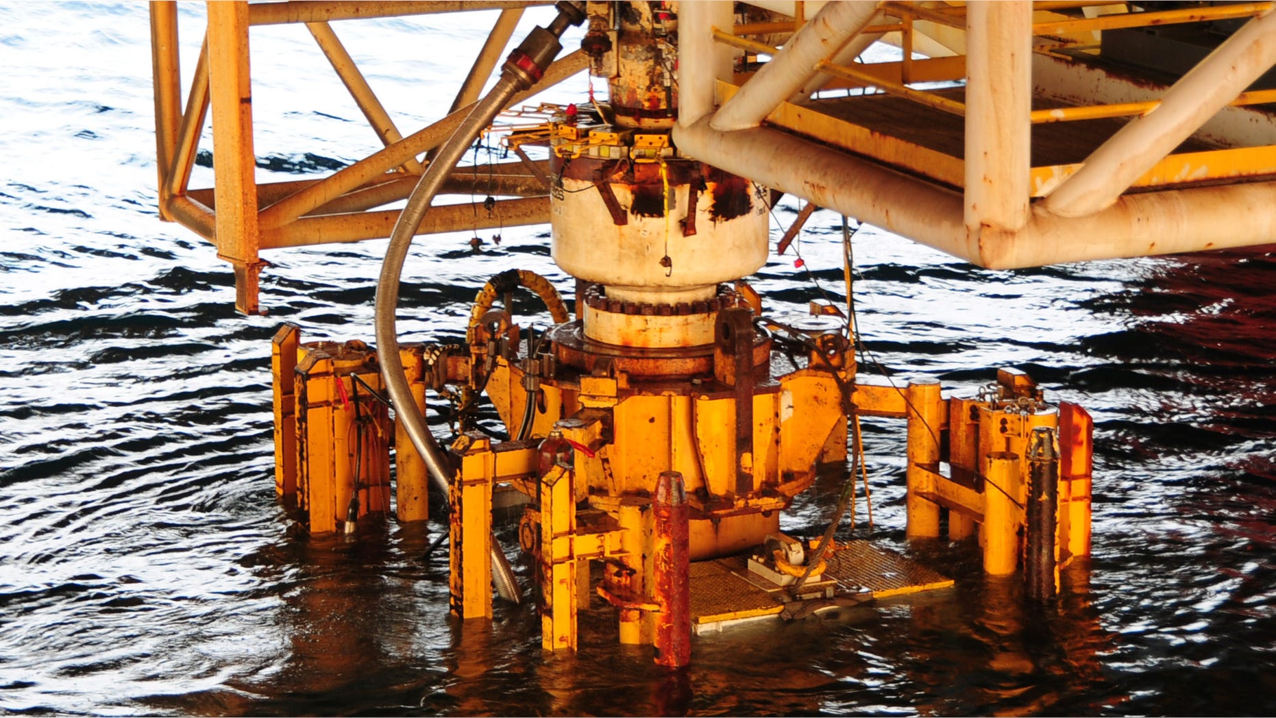 GULF OF MEXICO - SEPTEMBER 4: (EDITORS NOTE: Image has been released by U.S. Military prior to transmission.) In this handout image provided by the U.S. Coast Guard, the damaged blow out preventer along with the Lower Marine Riser Package (LMRP) cap from the Deepwater Horizon oil rig that caused the massive oil spill is extracted and put aboard the vessel Q4000 on September 4, 2010 in the Gulf of Mexico. The 50-foot, 300-ton preventer was removed and replaced on the well head by a newly tested preventer and will be taken for evidence to a NASA facility in Louisiana in the ongoing investigation with the Deepwater Horizon Criminal Investigation Team and FBI Evidence Recovery Team. (Photo by Petty Officer 1st Class Thomas M. Blue/U.S. Coast Guard via Getty Images)