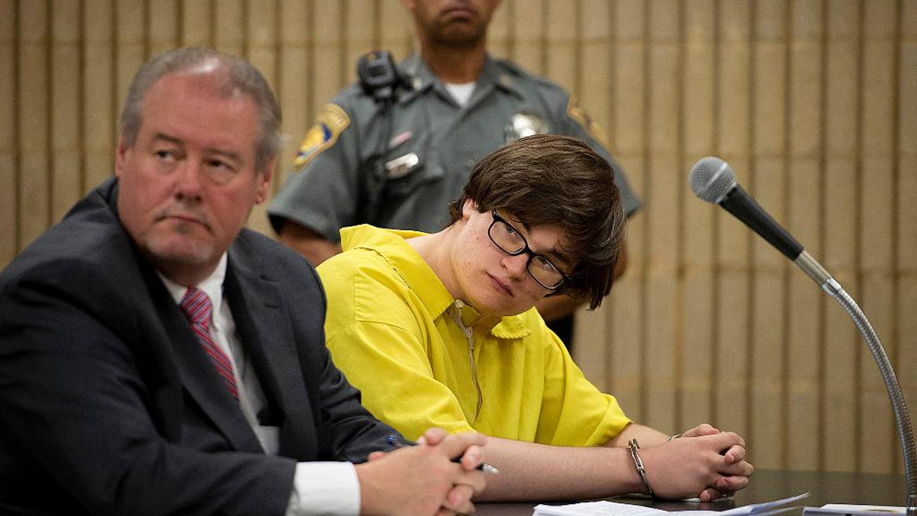Attorney Edward Gavin, left, sits in superior court with his client Christopher Plaskon during Plakson's sentencing Monday, June 6, 2016 in Milford, Conn. Plaskon was sentenced to 25 years in prison for fatally stabbing classmate Maren Sanchez inside Jonathan Law High School in Milford after she turned down his invitation to the junior prom in 2014. (Melanie Stengel/The Hartford Courant via AP, Pool)