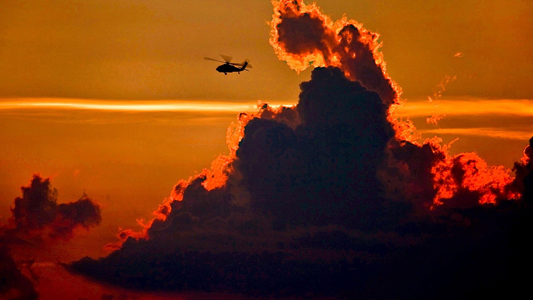 July 22, 2010: A UH-60 Black Hawk helicopter from the 1st Air Cavalry Brigade, 1st Cavalry Division, makes a traffic pattern near Robert Gray Army Airfield.