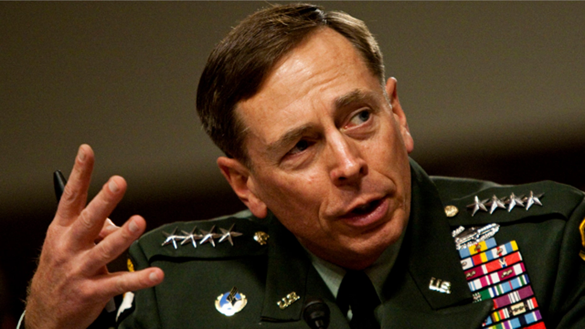 June 16: U.S. Central Commander Gen. David Petraeus testifies on Capitol Hill in Washington, before the Senate Armed Services Committee. (AP)