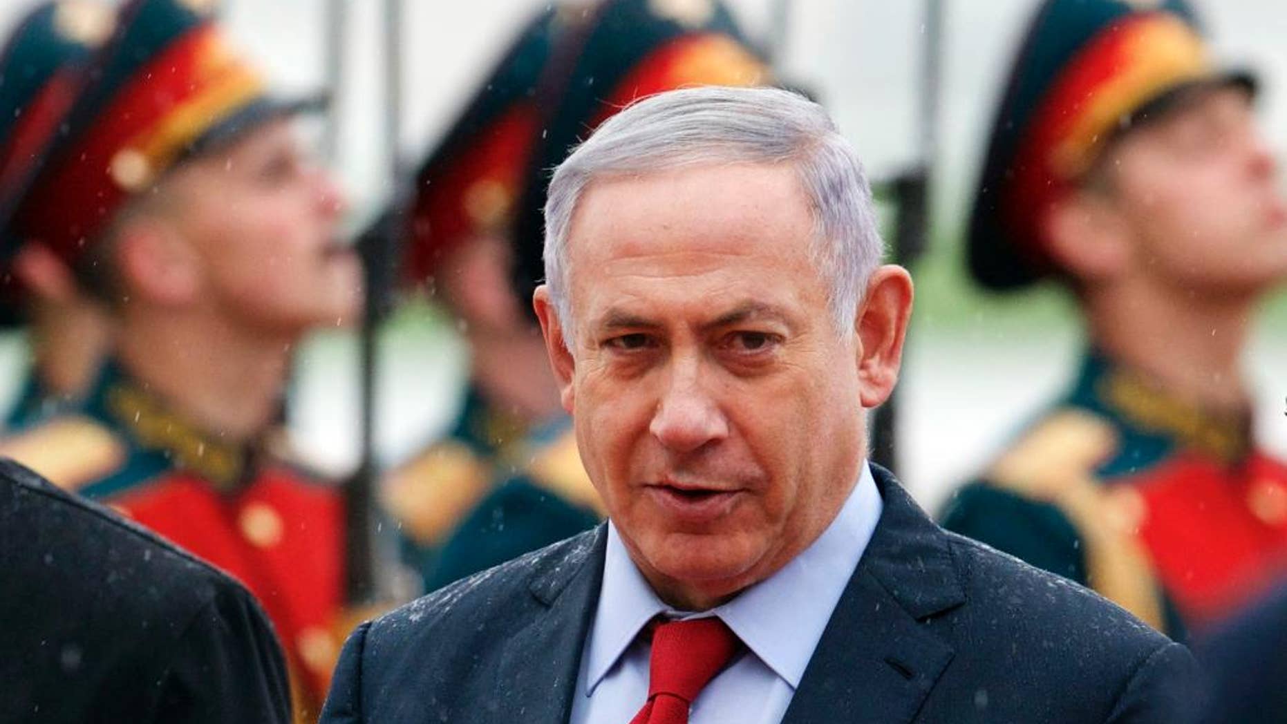 Israeli Prime Minister Benjamin Netanyahu reviews an honour guards shortly upon his arrival to government Vnukovo II airport just outside Moscow, Russia, on Monday, June 6, 2016. Netanyahu is on official visit to Russia. (AP Photo/Ivan Sekretarev)
