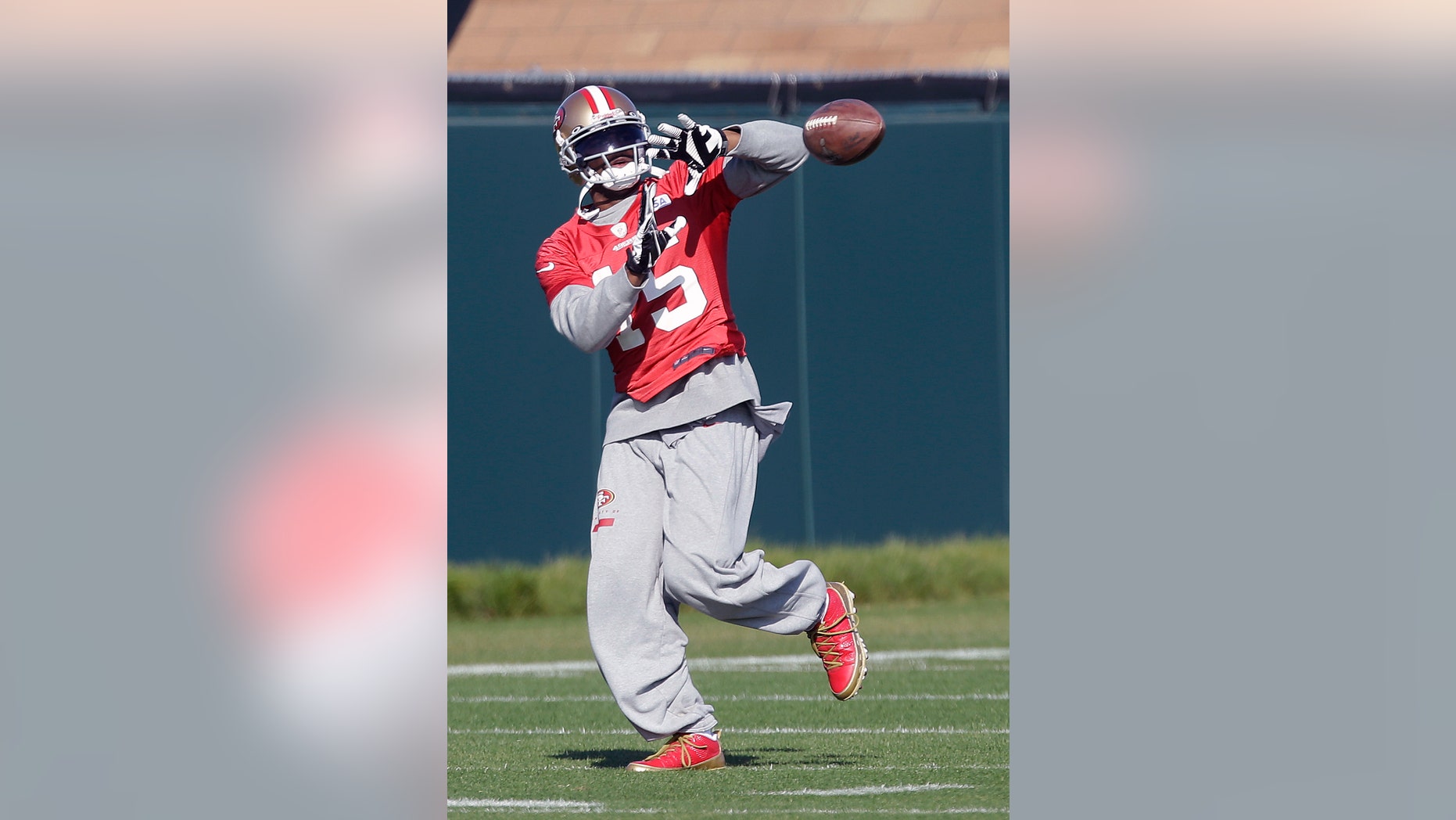 San Francisco 49ers wide receiver Michael Crabtree (15) practices at an NFL football training facility in Santa Clara, Calif., Friday, Jan. 25, 2013. The 49ers are scheduled to play the Baltimore Ravens in the Super Bowl on Sunday, Feb. 3. (AP Photo/Jeff Chiu)