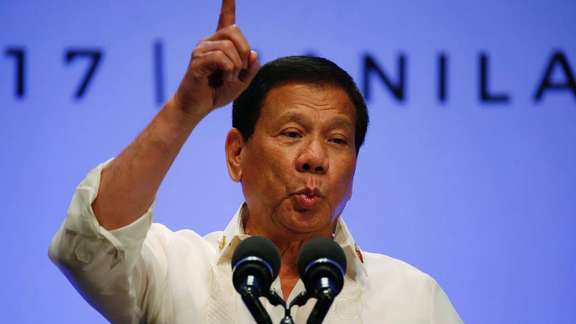 FILE - In this April 29, 2017 file photo, Philippines President Rodrigo Duterte gestures while addressing the media following the conclusion of the 30th ASEAN Leaders' Summit in Manila, Philippines. Philippine lawmakers have killed an impeachment complaint accusing President Rodrigo Duterte of crimes against humanity for the thousands of people who have died in his anti-drug crackdown. The Justice Committee of the House of Representatives, which is dominated by Duterte allies, declared Monday, May 15 during the first hearing on the matter that there was insufficient substance to proceed. (AP Photo/Bullit Marquez, File)