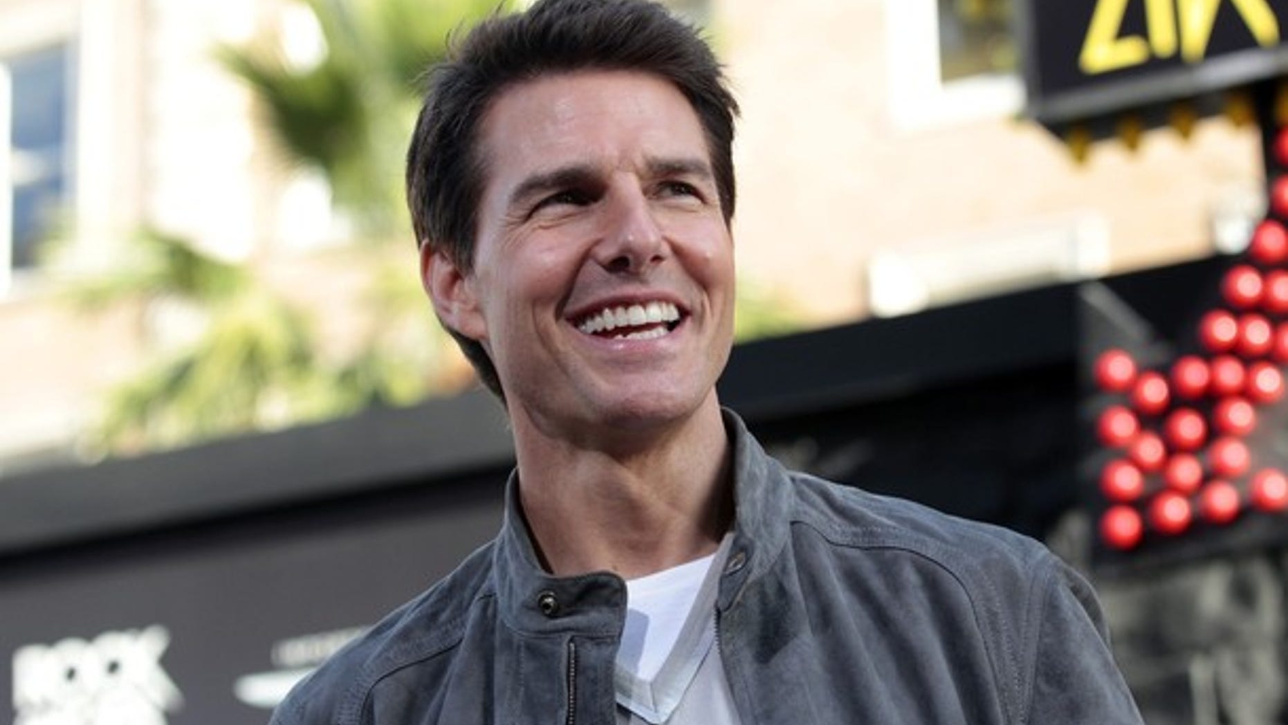 Cast member Tom Cruise poses at the premiere of "Rock of Ages" at the Grauman's Chinese theatre in Hollywood, California June 8, 2012. The movie opens in the U.S. on June 15. REUTERS/Mario Anzuoni (UNITED STATES - Tags: ENTERTAINMENT)