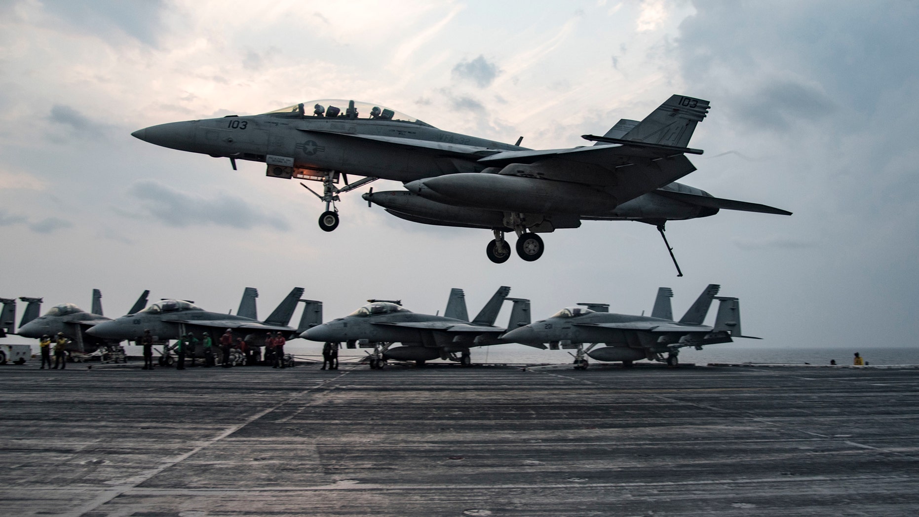 File photo - An F/A-18 F Super Hornet assigned to the Fighting Swordsmen of Strike Fighter Squadron (VFA) 32 prepares to make an arrested landing on the flight deck of the aircraft carrier USS Dwight D. Eisenhower (CVN 69) (Ike) in the Arabian Gulf.
