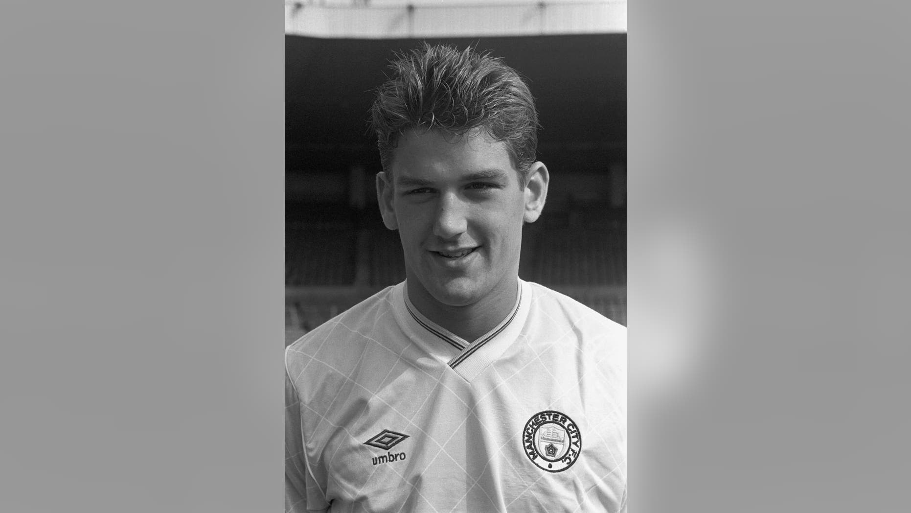 FILE - This is a Aug 20, 1987 file of former Manchester City soccer player David White. One by one former English soccer players who were subjected to years of sexual abuse by youth-team coaches are breaking cover to expose the game’s dark secrets. English soccer team Manchester City launched an investigation after former players David White and Paul Stewart who played for the club across the 1980s and 1990s and went on to feature for England, came forward with their stories of abuse. (PA, File via AP)