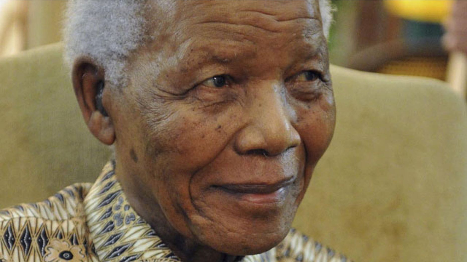 In this photo supplied by Government Communications and Information Services (GCIS) former South African President Nelson Mandela, is seen after casting his early ballot in upcoming local elections at his home in Johannesburg in this May 16, 2011 file photo.