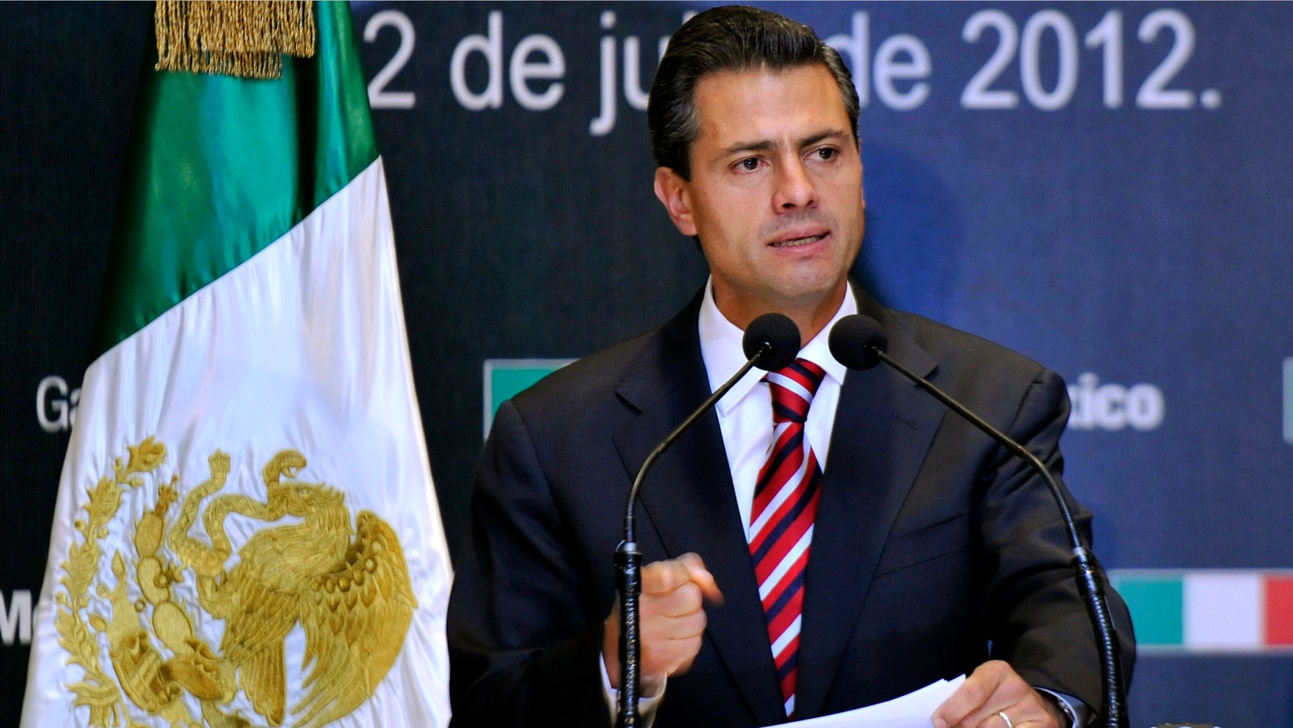 MEXICO CITY, MEXICO - JULY 2: Presidential candidate Enrique Pena Nieto of the Institutional Revolutionary Party (PRI) speaks during a press conference on July 2, 2012 in Mexico City, Mexico. According to reports, a vote count by the independent Federal Electoral Institute (LIFE) has give Pena Nieto and the PRI the win in the presidential election, but it looks unlikely the will have a majority in either house of Congress. (Photo by Daniel Aguilar/Getty Images)