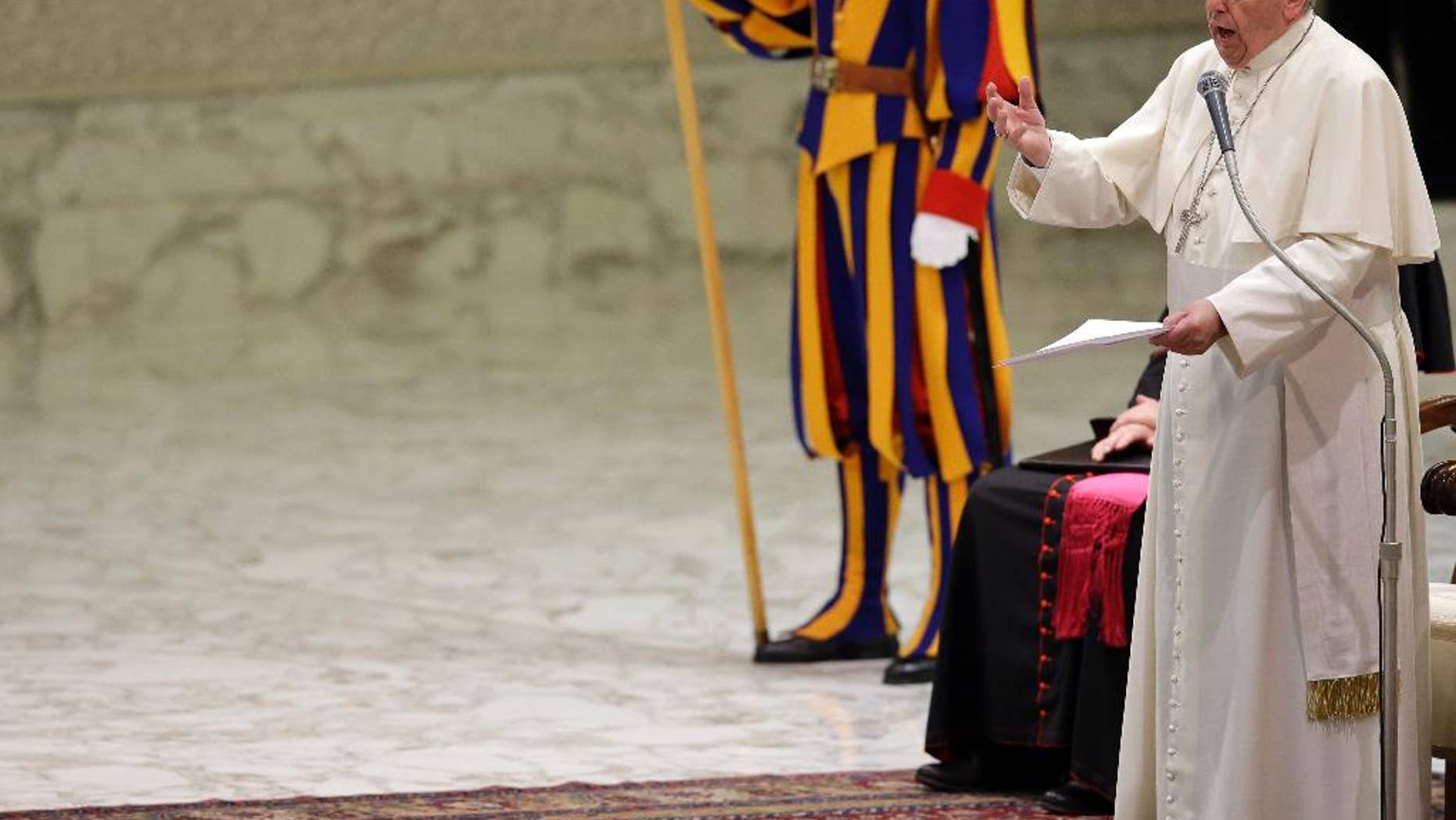 Pope Francis delives his speech during an audience with members of the "Policoro Group" a catholic association created by Italian Episcopal Conference to promote youth employment, at the Vatican, Monday, Dec. 14, 2015. (AP Photo/Gregorio Borgia)