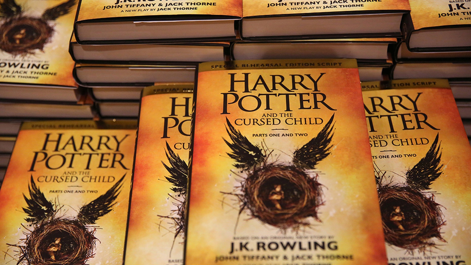 Copies of the book of the play of Harry Potter and the Cursed Child parts One and Two are displayed at a bookstore in London, Britain July 31, 2016. REUTERS/Neil Hall - S1BETSQKBOAA