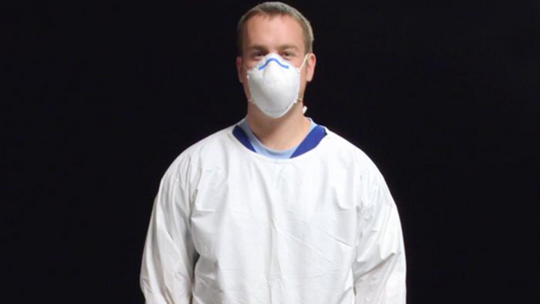 When it comes to preventing flu spread, especially during a pandemic, wearing face masks like this one could be medically and economically effective.