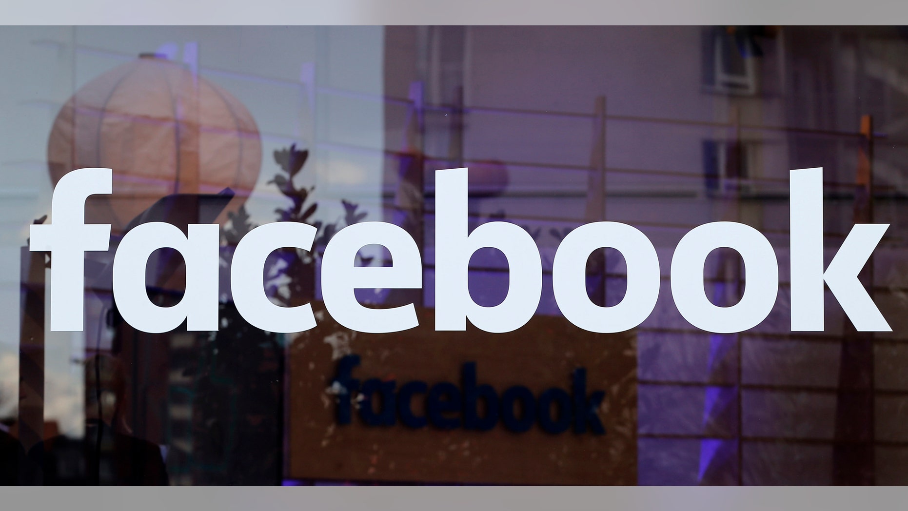 File photo: The logo of Facebook is pictured on a window at new Facebook Innovation Hub during a media tour in Berlin, Germany, February 24, 2016. (REUTERS/Fabrizio Bensch)
