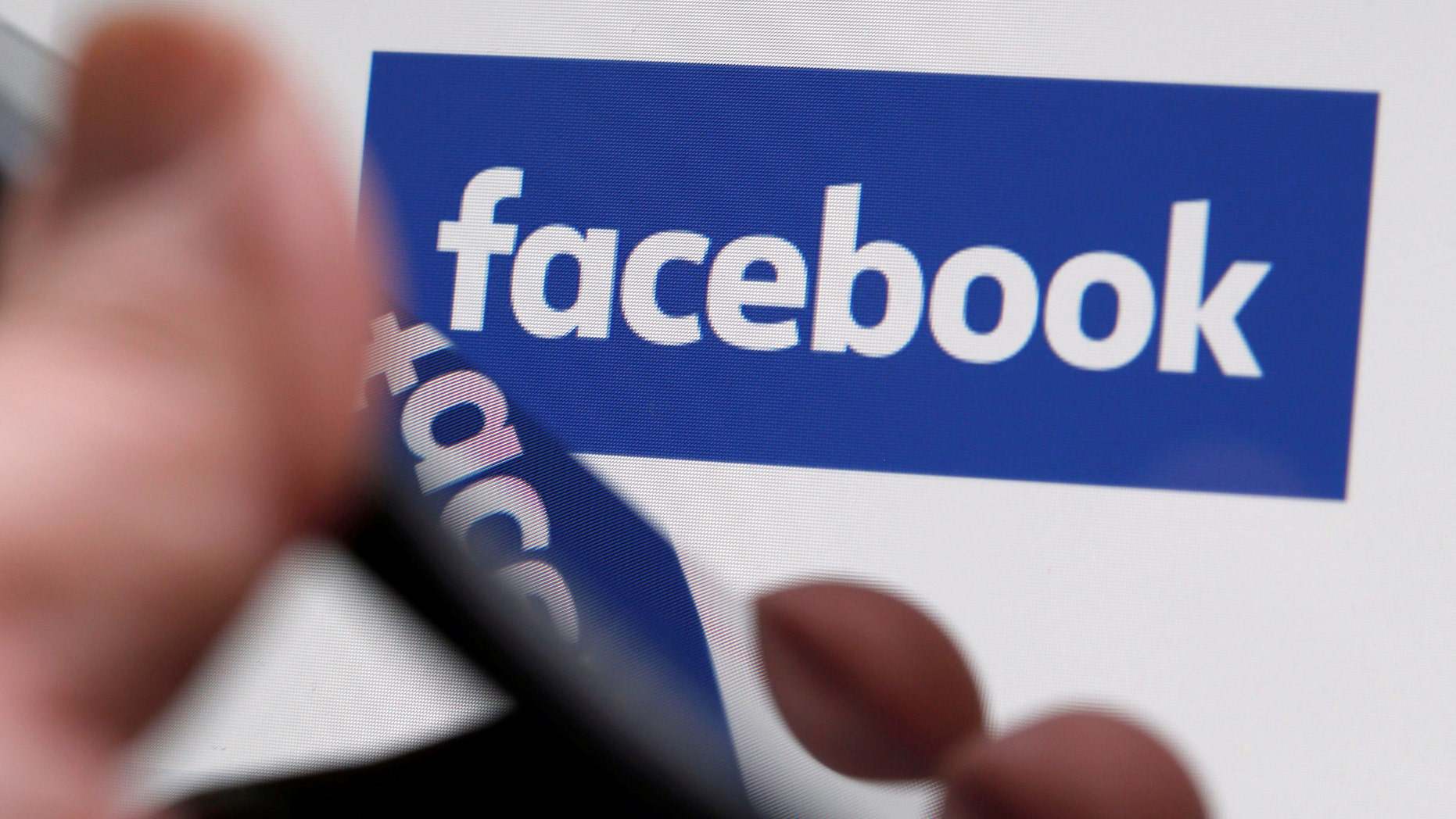 The Facebook logo is displayed on their website in an illustration photo taken in Bordeaux, France, Feb. 1, 2017. (REUTERS/Regis Duvignau)