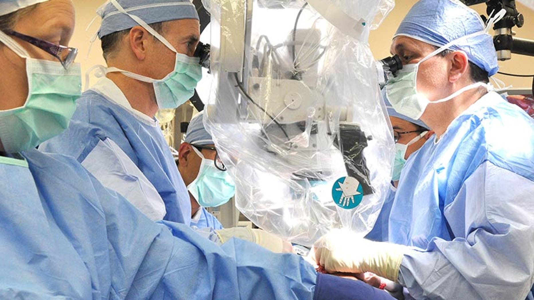 A team of surgeons at Cleveland Clinic complete a 24.5 hour-long face transplant on a patient.
