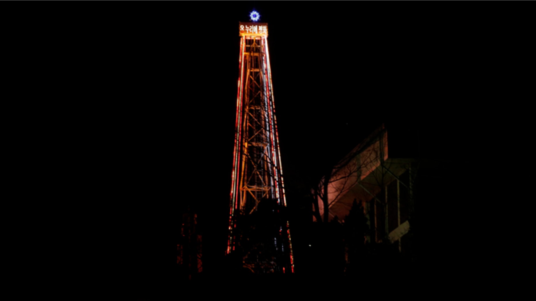 Dec. 22, 2012: A 100-foot-tall steel Christmas tree with about 30,000 light bulbs, is lit by Christian groups at the western mountain peak, known as Aegibong, in Gimpo, South Korea.
