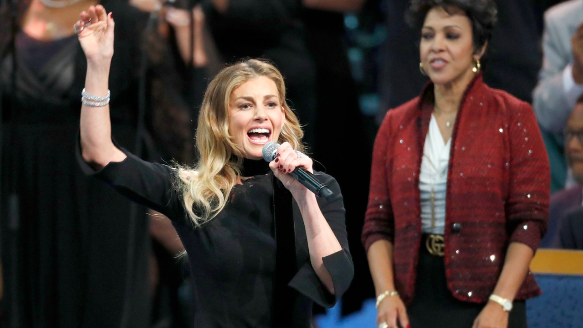 Faith Hill performs during the funeral service for Aretha Franklin at Greater Grace Temple, Friday, Aug. 31, 2018, in Detroit. Hill's husband, Tim McGraw, said on Tuesday that his father-in-law died last week.