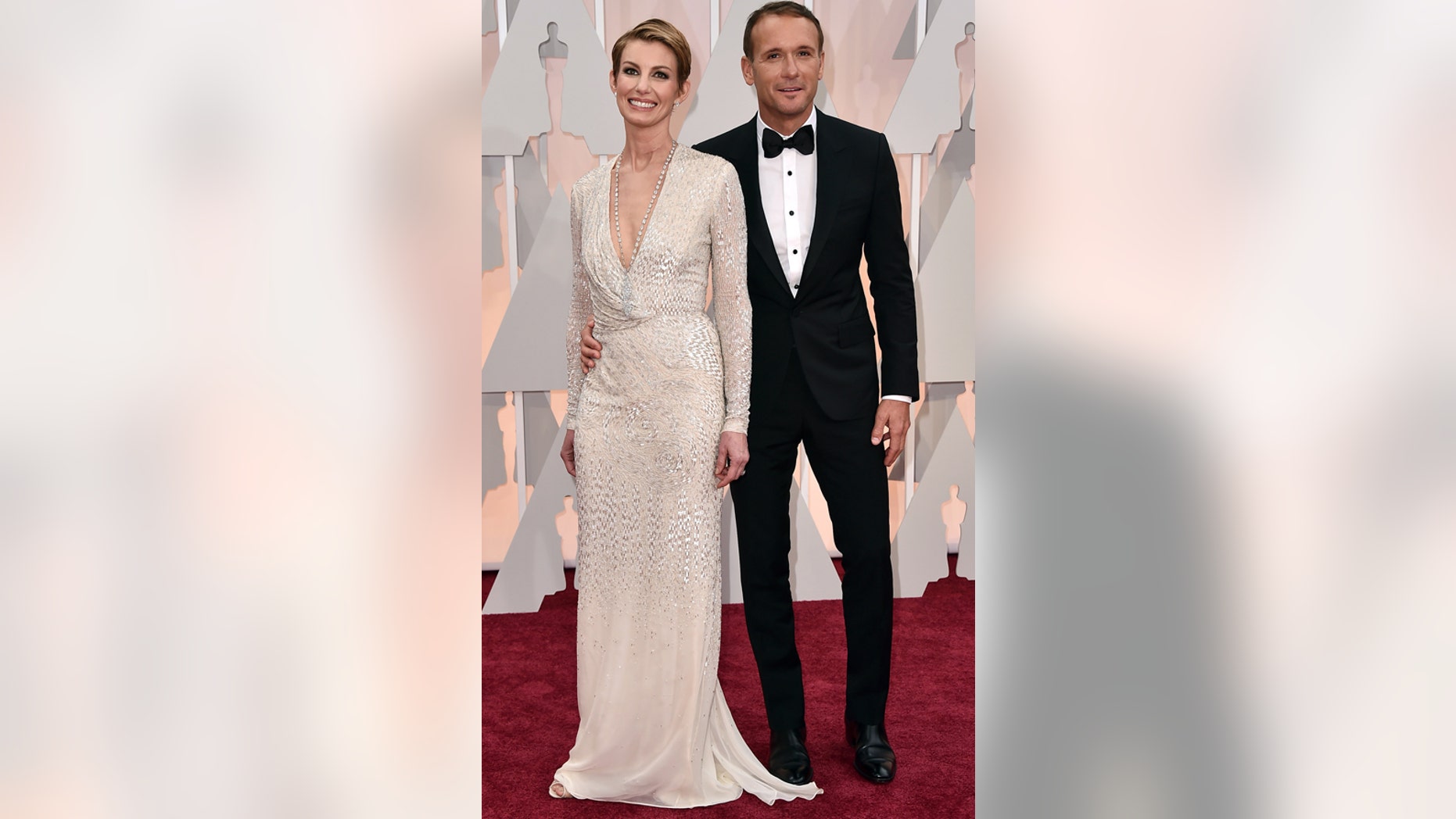 Faith Hill, left, and Tim McGraw arrive at the Oscars on Sunday, Feb. 22, 2015, at the Dolby Theatre in Los Angeles.