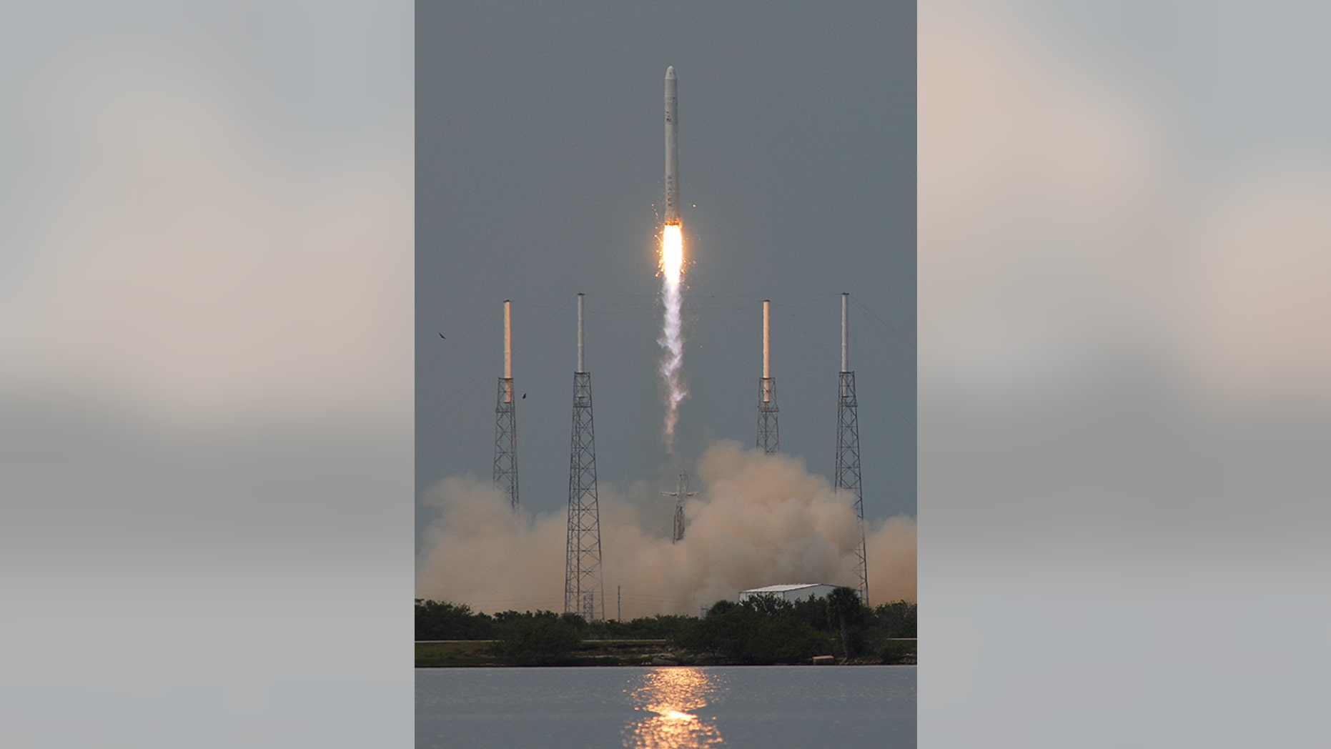 Launch photographer Ben Cooper captured this photo of the SpaceX Falcon 9 rocket making its maiden flight June 4, 2010 from Cape Canaveral, Fla.