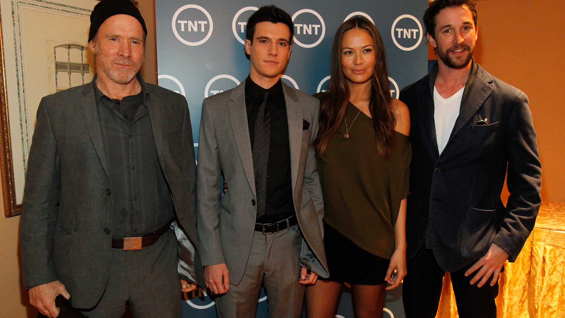 Cast members Will Patton, Drew Roy, Moon Bloodgood and Noah Wyle from the television series "Falling Skies" pose during the Turner Broadcasting Television Critics Association winter press tour in Pasadena, California January 6, 2011. REUTERS
