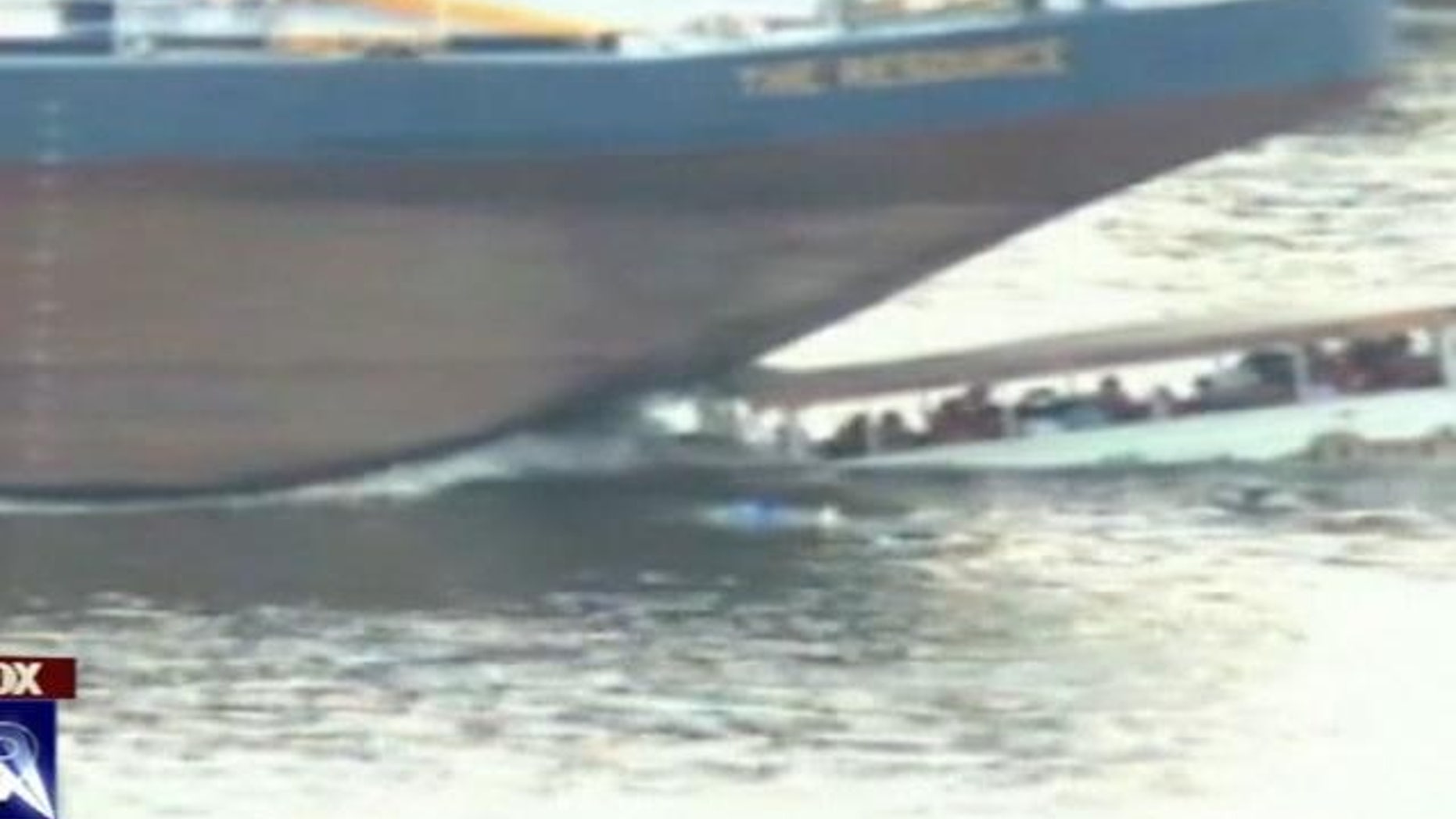 This image, taken from a video obtained by Fox affiliate WTXF-TV, shows the moment a tugboat-guided barge slammed into a tour boat on the Delaware River.