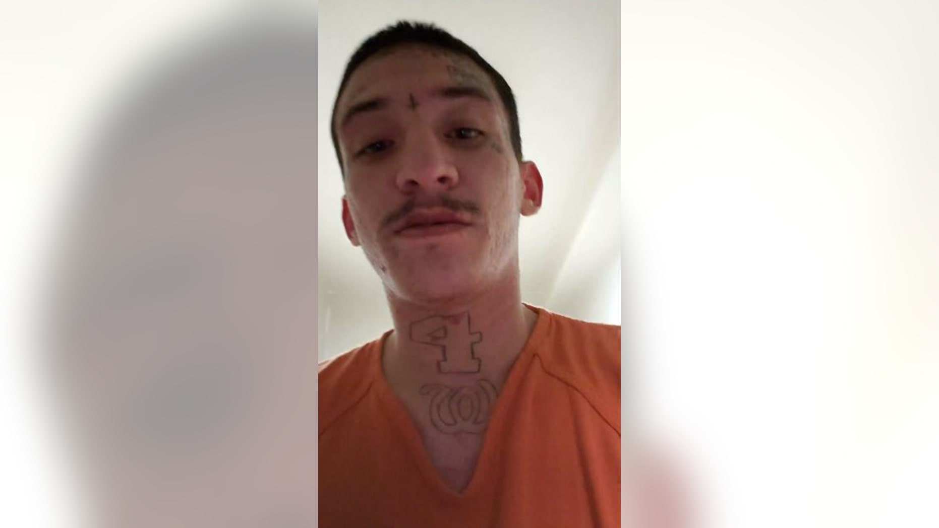 Joseph Chavez, 22, records a Facebook Live video inside his jail pod in Jefferson County, Colo., on Thursday.