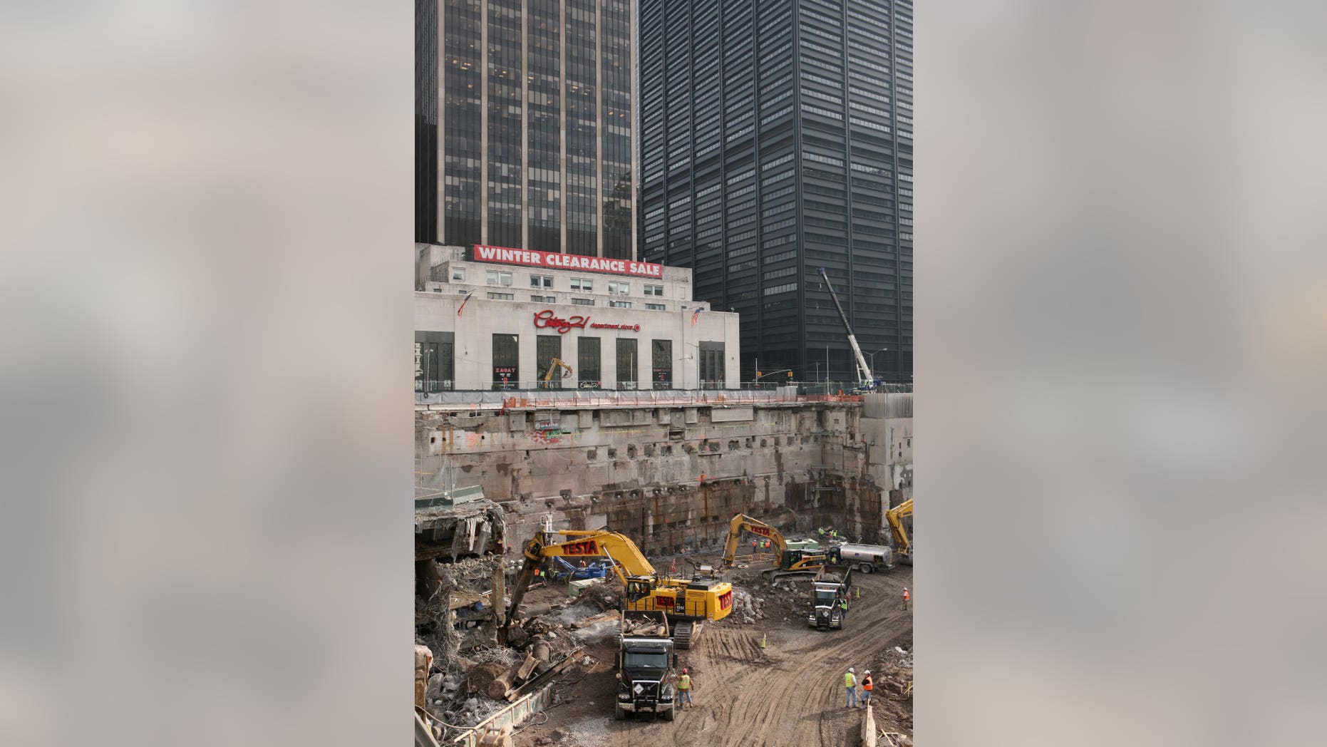 FILE - Construction workers and equipment excavate the southeastern corner of the World Trade Center site on in this Jan. 8, 2008 file photo taken in New York. About 60 truckloads of debris that could contain tiny human bone fragments have been unearthed by construction crews working on the new World Trade Center tower in recent years. That material is now being transported to a park built on top of the former Fresh Kills landfill on Staten Island. City officials say investigators will spend 10 weeks attempting to identify the remains. Investigators began sifting through newly uncovered debris from the World Trade Center on Monday April 1, 2013 for the first time in three years. (AP Photo/Mark Lennihan, File)
