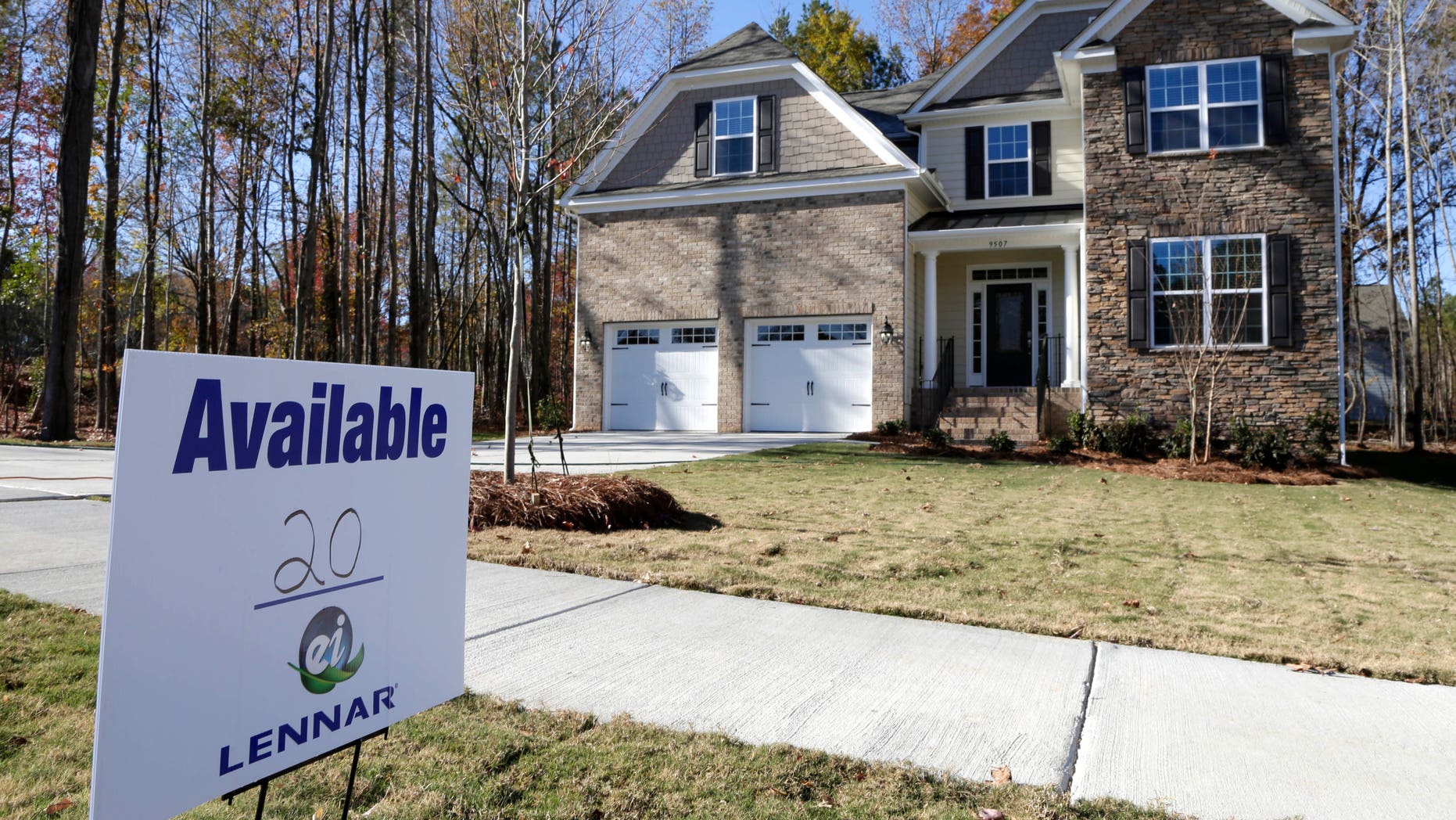 FILE - In this Nov. 14, 2013 file photo, a home is advertised for sale in Matthews, N.C. Freddie Mac, the mortgage company, releases weekly mortgage rates on Thursday, Jan. 9, 2014. (AP Photo/Chuck Burton, File)