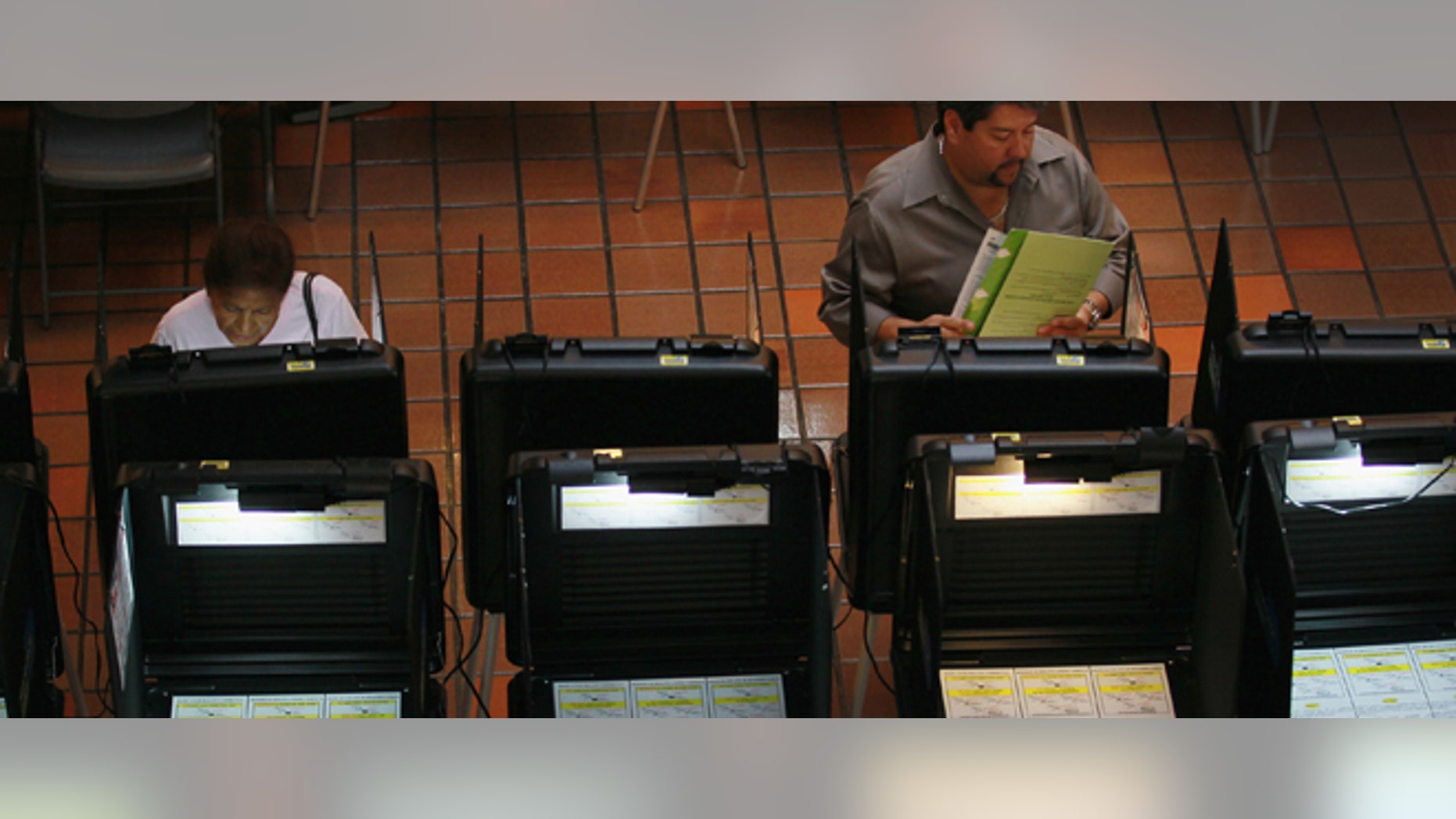 MIAMI, FL - MAY 09: Early voters fill out their ballots as they cast their votes before the general election date scheduled for May 24th, during the special election to select a new Miami-Dade mayor on May 9, 2011 in Miami, Florida. The former mayor Carlos Alvarez was voted out of office by voters unhappy with a property tax rate increase and the fact that he gave salary raises to county employees during a deep recession. The vote to oust the former mayor made Miami-Dade the most populous area ever to recall a local official. 11 candidates are running for the open seat. (Photo by Joe Raedle/Getty Images)