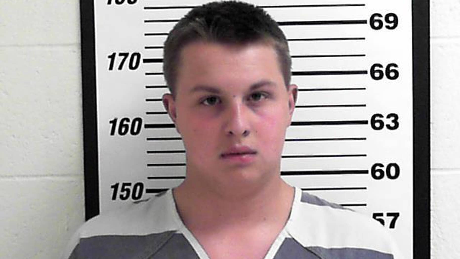 This photo provided by the Davis County Jail shows Tanis Ukena. Ukena, a Utah sandwich shop employee has been arrested on accusations he put methamphetamine and THC into the drink of a uniformed police officer.