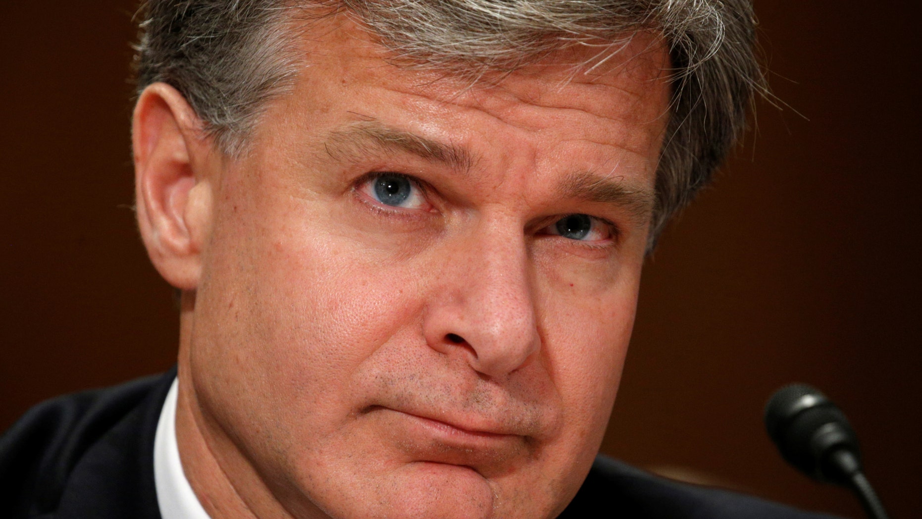 File photo - FBI Director Christopher Wray testifies before a Senate Homeland Security and Governmental Affairs hearing on "Threats to the homeland" on Capitol Hill in Washington, U.S., Sept. 27, 2017. (REUTERS/Kevin Lamarque)