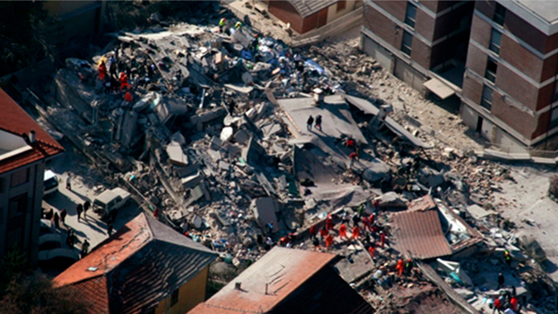 April 6, 2009: An aerial photo provided by the Italian Police shows the debris of a collapsed building in an area near L'Aquila, central Italy, after a powerful earthquake shook central Italy.