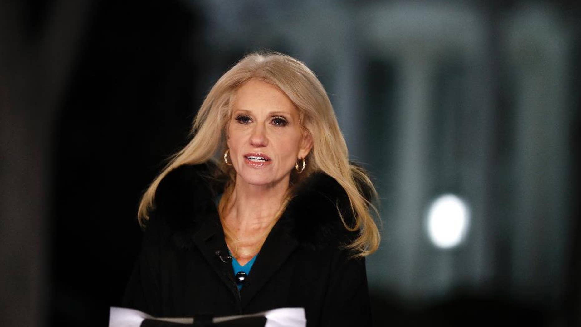 Counselor to President Donald Trump Kellyanne Conway speaks during a television interview with the White House in the background, in Washington, Thursday, Feb. 9, 2017, about the Federal appeals court refusal to reinstate President Donald Trump's travel ban. (AP Photo/Carolyn Kaster)