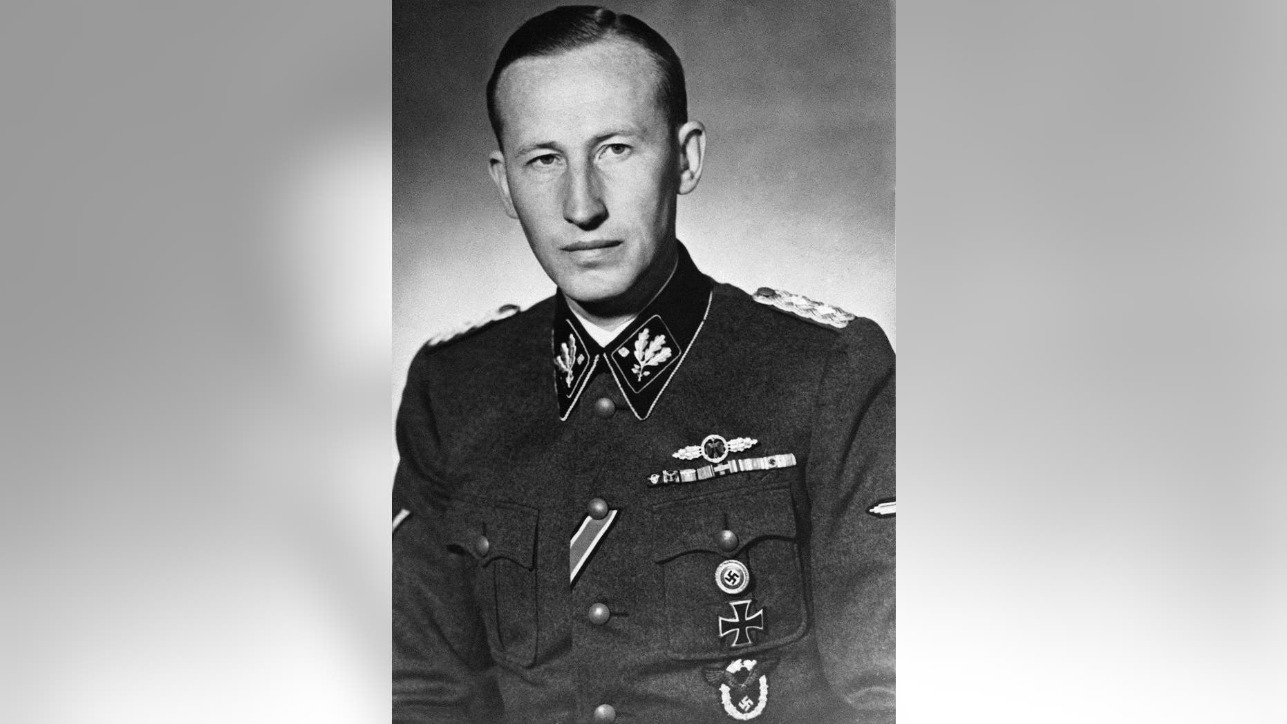 FILE - The 1942 file photo shows Nazi leader Reinhard Heydrich in an unknown location sometime in 1942. Lina Heydrich, the widow of assassinated Heydrich, one of the main architects of the Holocaust, was among the most prominent recipients of pensions for “victims of war” who were injured in World War II. (AP Photo)