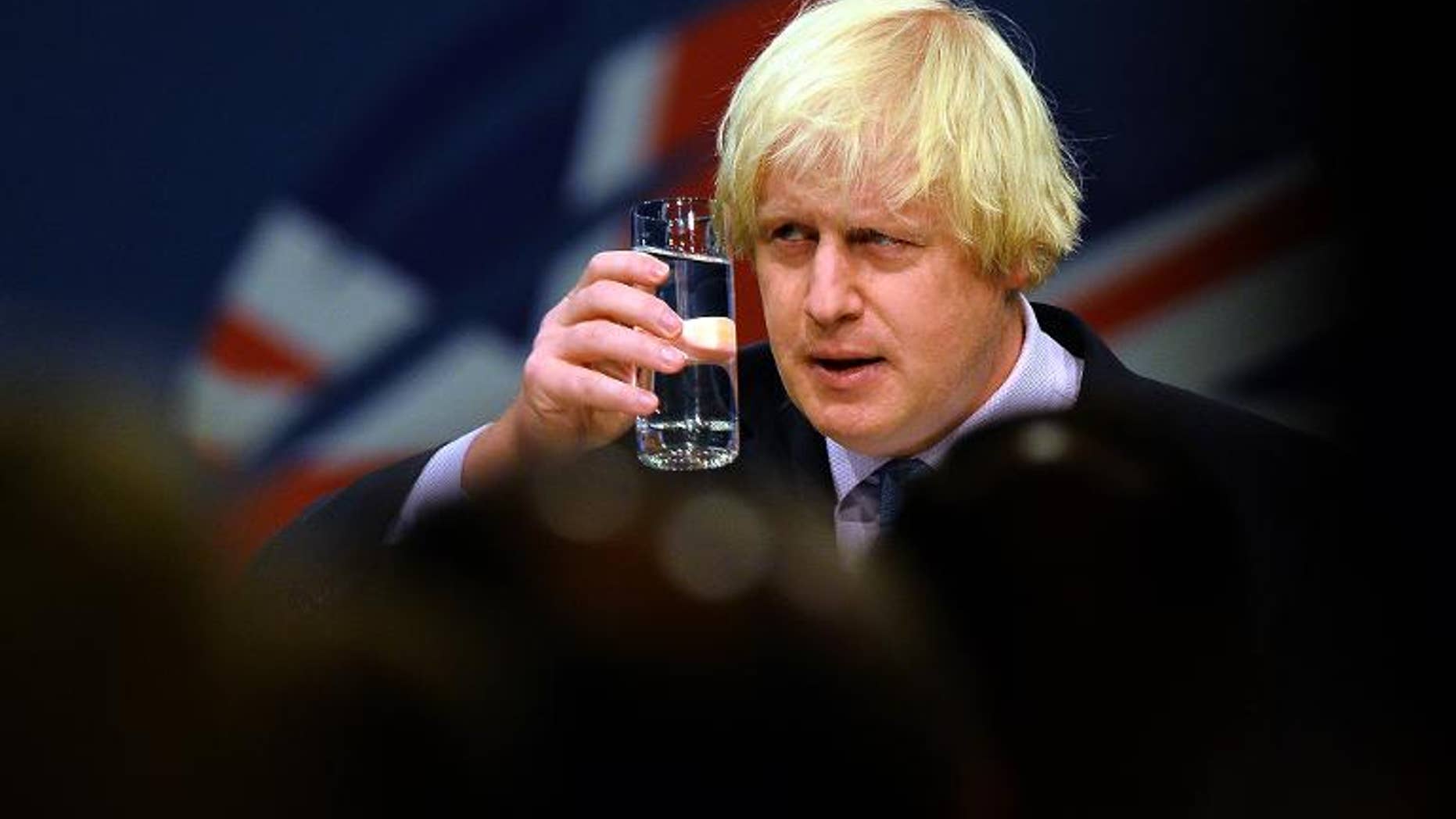 London Mayor Boris Johnson acknowledges the applause from delegates after addressing the annual Conservative Party Conference in Manchester, on October 1, 2013