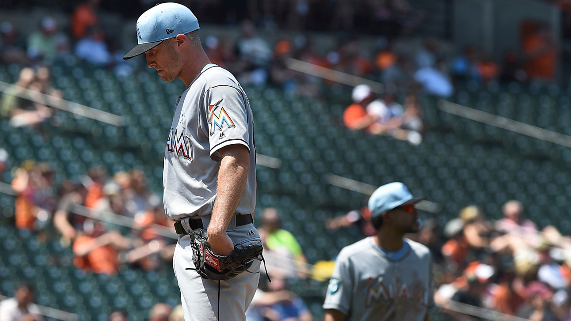 Miami Marlins pitcher Trevor Richards pauses before leaving a baseball game against the Baltimore Orioles' in the fourth inning Sunday, June 17, 2018, in Baltimore.