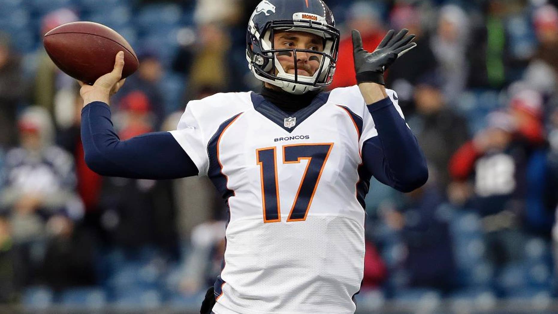 FILE - In a Nov. 2, 2014, file photo Denver Broncos quarterback Brock Osweiler warms up before an NFL football game against the New England Patriots in Foxborough, Mass. Osweiler has waited patiently as Peyton Manning's backup for 2 ½ years. He was disappointed on Sunday, Nov. 9, 2014, when he was all warmed up and ready to go in the game only to see the five-time MVP trot back onto the field. (AP Photo/Steven Senne)