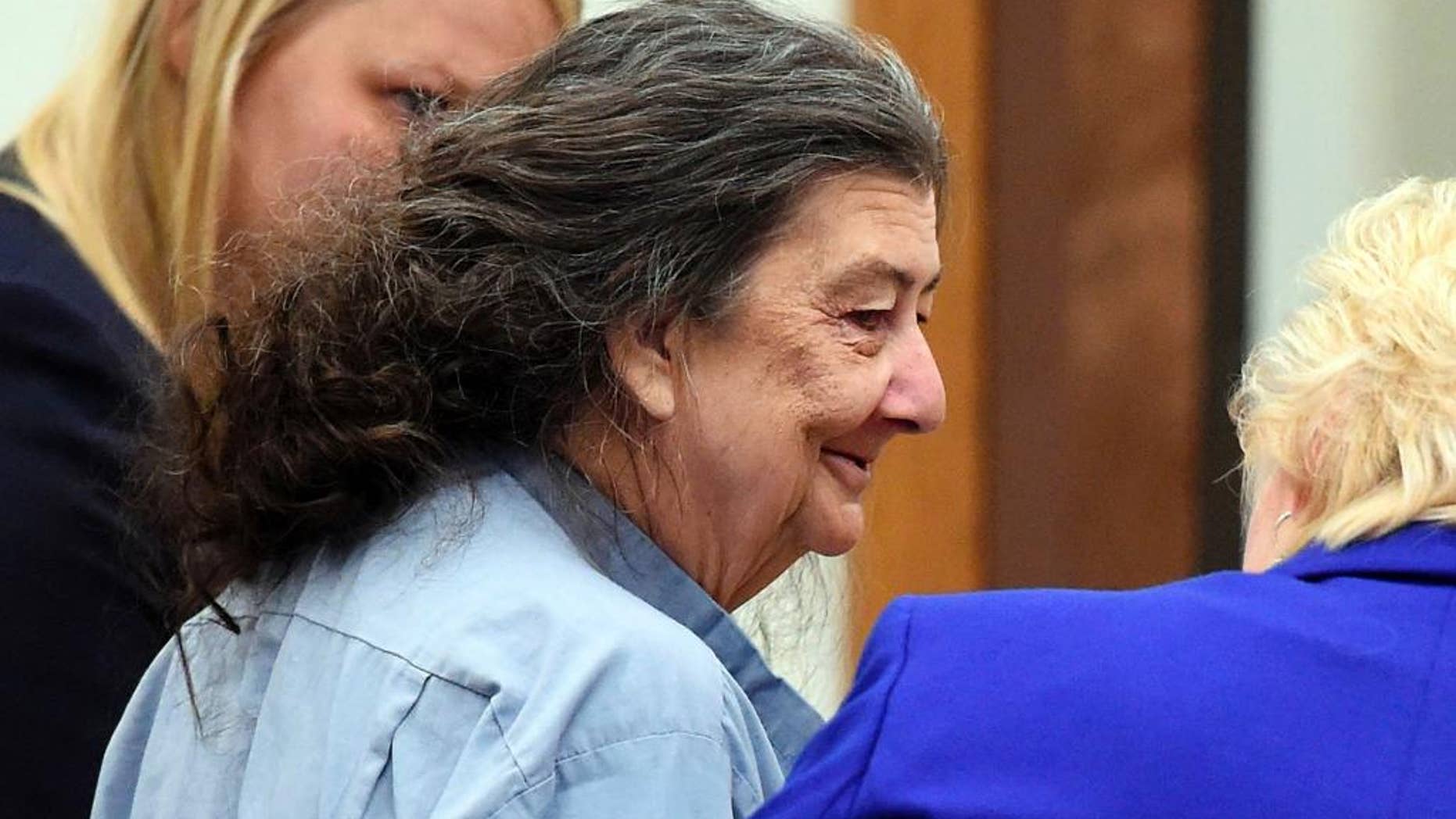 FILE - In this Sept. 8, 2014, file photo, Cathy Woods appears in Washoe District court in Reno, Nev. Woods, imprisoned for 35 years before being exonerated in a 1976 Reno murder case, is suing officials in Nevada and Louisiana on federal civil rights, malicious prosecution and conspiracy claims. (Andy Barron/The Reno Gazette-Journal via AP, File)