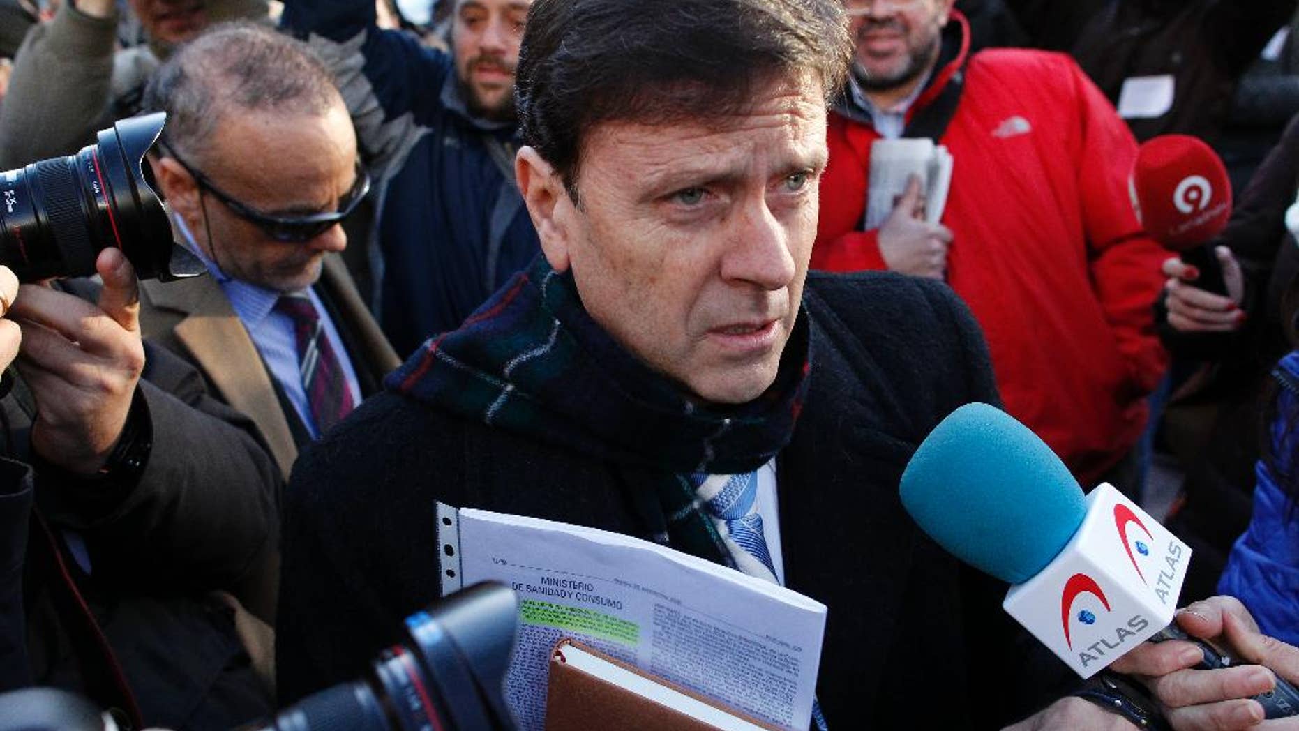 FILE - In this Monday, Jan. 28, 2013 file photo, Doctor Eufemiano Fuentes arrives at a court house in Madrid, Spain. A court was set to rule Tuesday June 14, 2016, on whether hundreds of blood bags that are key evidence in one of Spain's worst doping scandals should be destroyed or handed over to authorities for investigation. (AP Photo/Andres Kudacki, File)