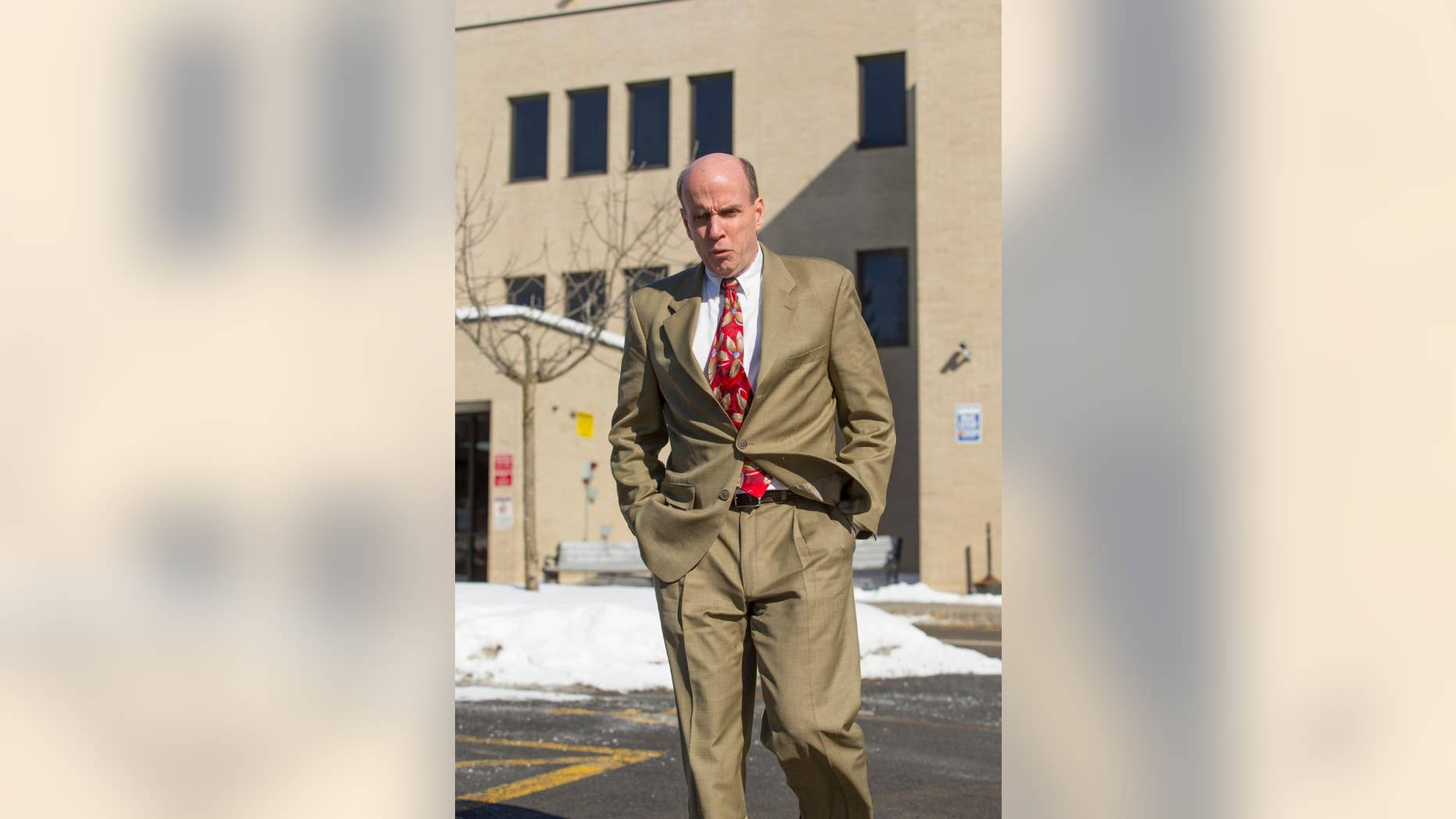 FILE - In this Feb. 5, 2015, file photo, Calvin Harris walks out of the Schoharie County Courthouse after the Tioga County district attorney made his opening statement in his third trial in Schoharie, N.Y. For the fourth time since Michele Harris disappeared in 2001, her estranged husband Harris will go on trial for murder in upstate New York. Jury selection on the latest trial starts Monday, March 28, 2016. (Simon Wheeler/The Journal via AP, File) NO SALES; MANDATORY