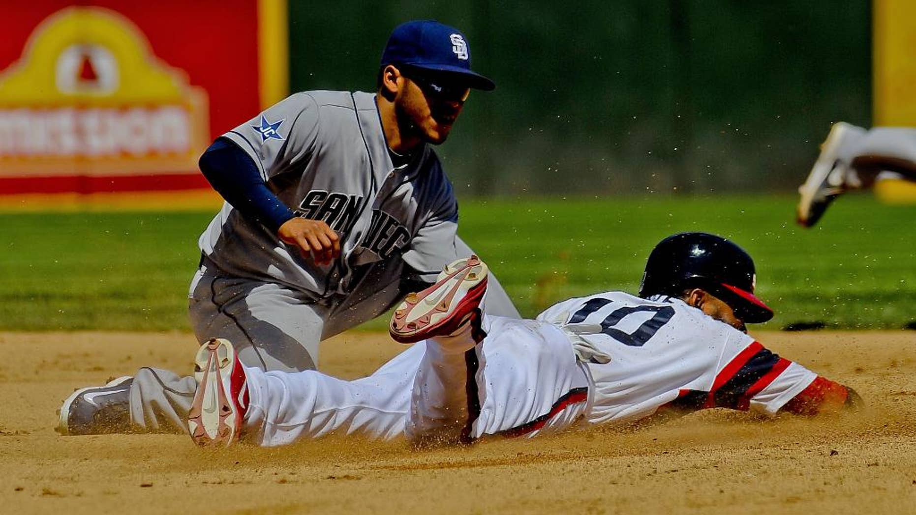 Chicago White Sox' Alexei Ramirez steals second base against San Diego Padres' Alexi Amirista during the fourth inning of a baseball game on Saturday, May 31, 2014, in Chicago. (AP Photo/Matt Marton)