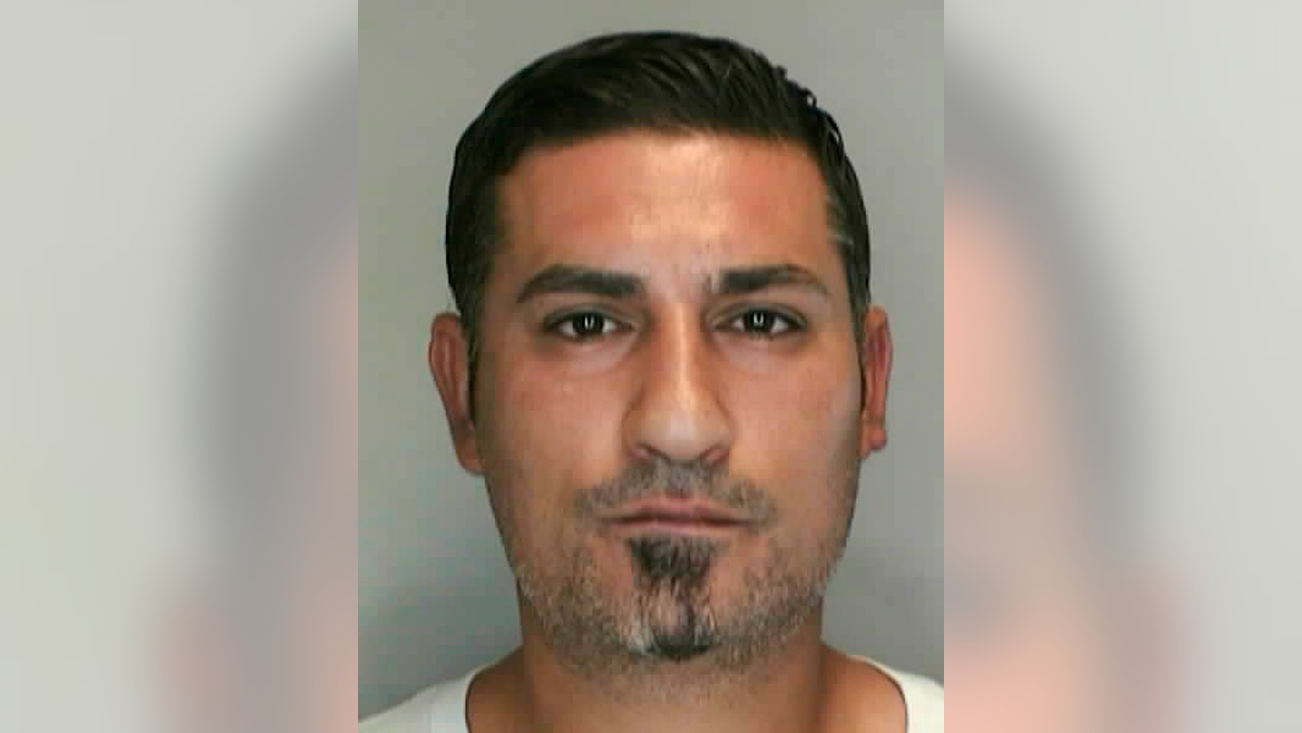FILE- In this file photo provided by the Livonia, Mich., Police Department is Baseel Abdul-Amir Saad, 37. Saad was sentenced to at least eight years in prison for a punch that killed soccer referee John Bieniewicz during a game last summer. Bieniewicz' wife filed a $51 million lawsuit Friday, April 3, 2014 against Saad. (AP Photo/Livonia Police Department, File)