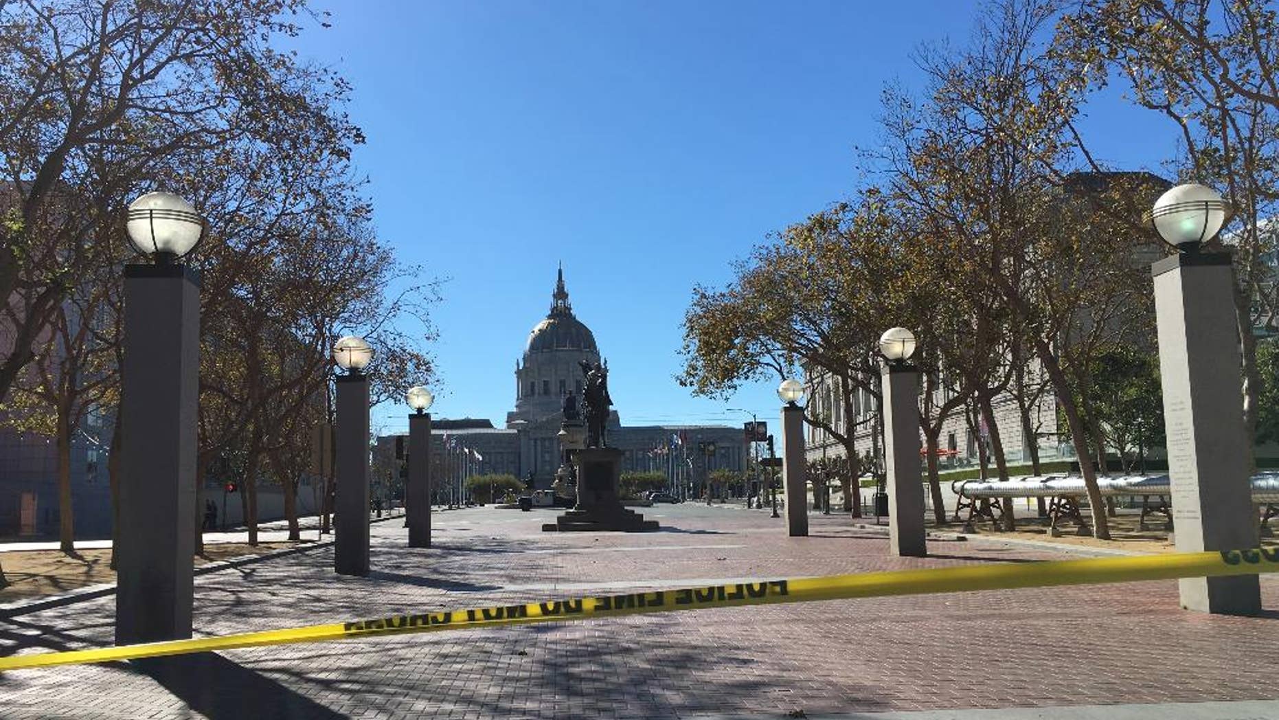 Police in San Francisco have blocked off traffic around Civic Center and United Nations Plaza after receiving reports of a man who might be armed, Saturday, Sept. 24, 2016. KGO-TV said Saturday that pedestrians and motorists are being asked to leave the area amid reports of a man holding up something that may be a weapon.