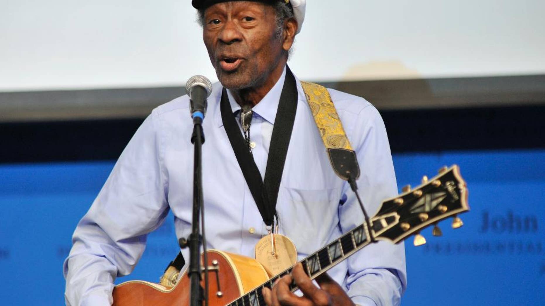 FILE - In this Feb. 26, 2012 file photo, rock 'n' roll legend Chuck Berry performs "Johnny B. Goode" at the John F. Kennedy Presidential Library and Museum in Boston. Berry is set to release his first new studio album in more than 35 years. The album, titled "Chuck," will be available in 2017. (AP Photo/Josh Reynolds, File)
